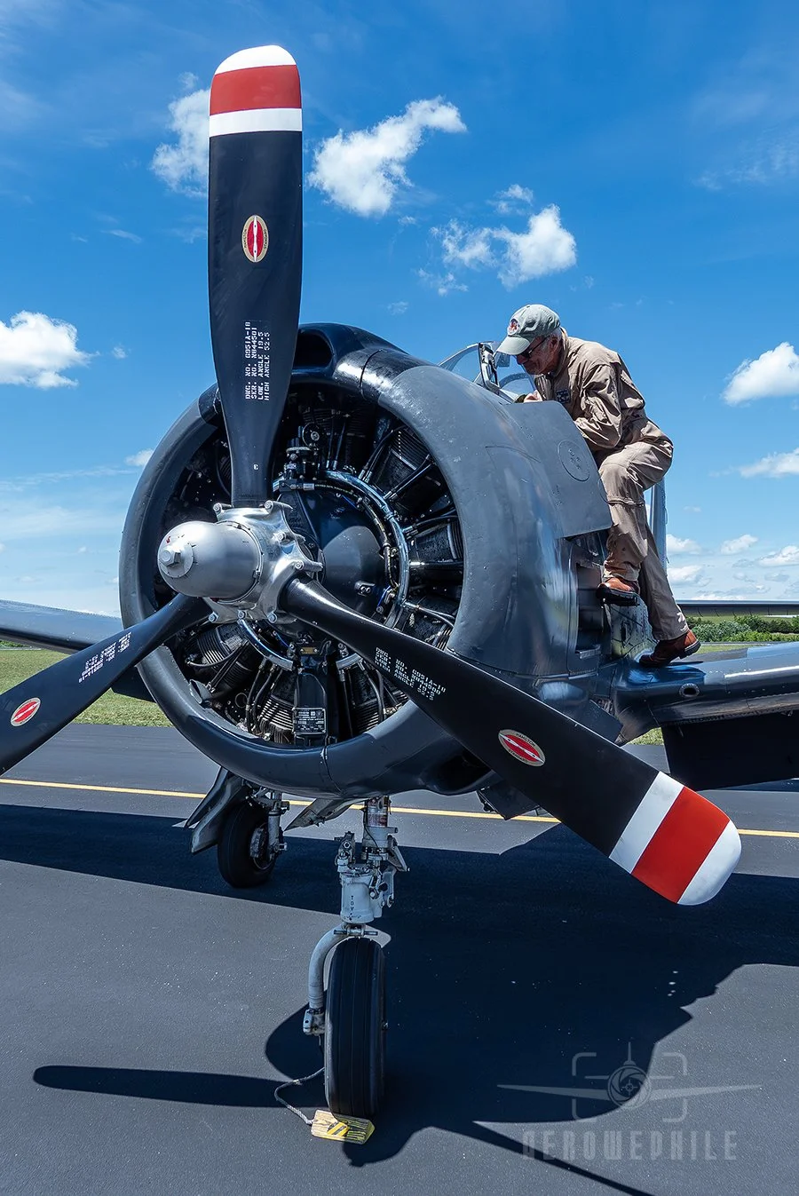 Neal checking the fluid levels on his North American T-28B Trojan prior to departure. Wings & Wheels - Greeneville Municipal Airport (GCY) 
02May26