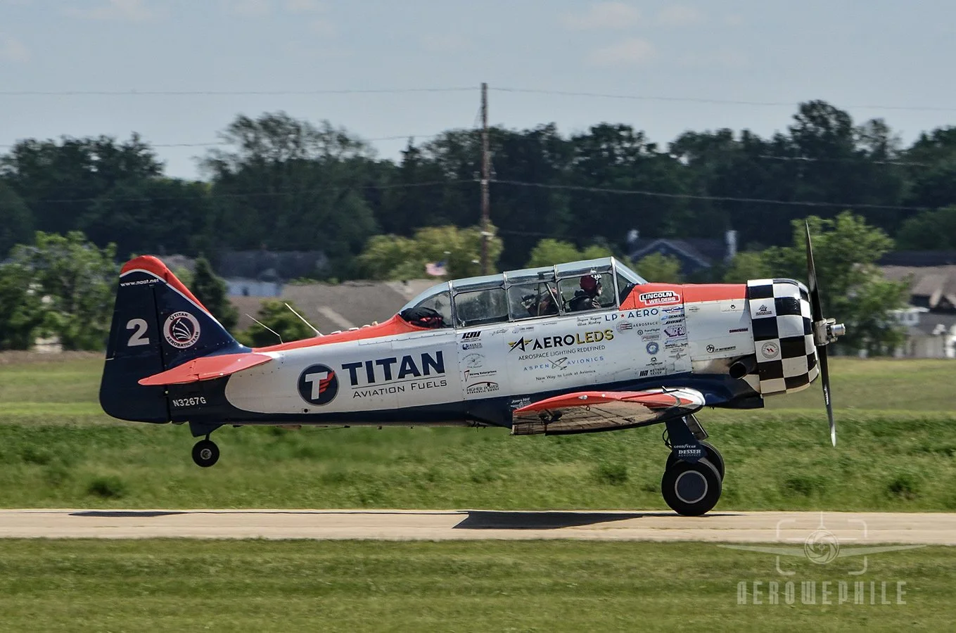 TITAN Aerobatic Team - North American AT-6 Texan taking off.