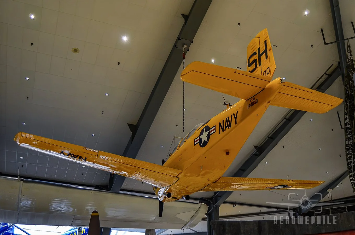 This early version of the T-34 Mentor became operational during the 1950s, and was used by the Navy for over twenty years, accumulating almost 100,000 flight hours per year. The T-34B Mentor on display (Bureau Number 144040) was acquired from the U.S