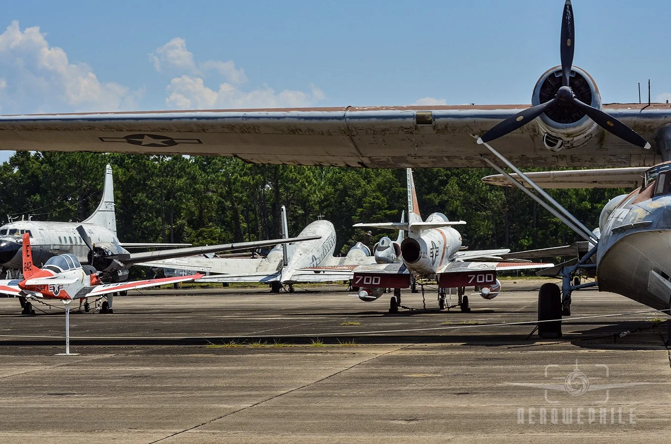 T-34C Turbomentor, Convair C-131F (R4Y-2) Samaritan, Douglas R4D Skytrain, A-4 Skyhawk, and PBY-5A Catalina.