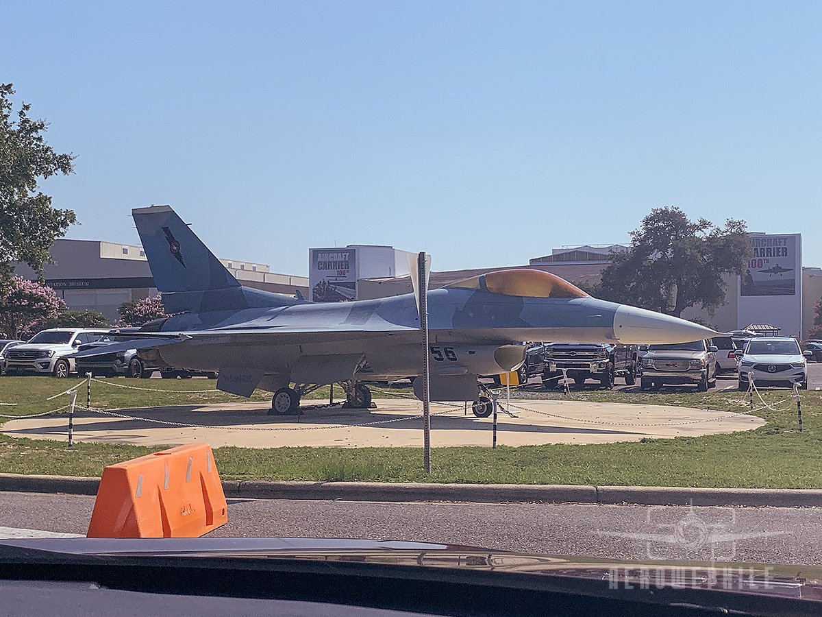 Naval General Dynamics F-16N Viper on display outside next to the museum parking lot.