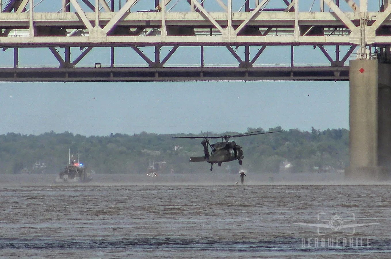 UH-60 Helocast (Bravo Co. 2-147 Air Assault, Frankfort) dropping a member of the 123rd Special Tactics Squadron (KY ANG, Louisville, KY) into the Ohio River.