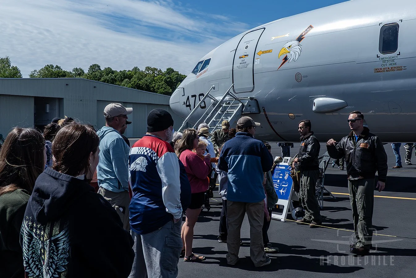 One of the Poseidon crew members explaining the capabilities and uses of the U.S. Navy Boeing P-8A Poseidon to the assembled crowd. 
Wings & Wheels - Greeneville Municipal Airport (GCY)
02May26