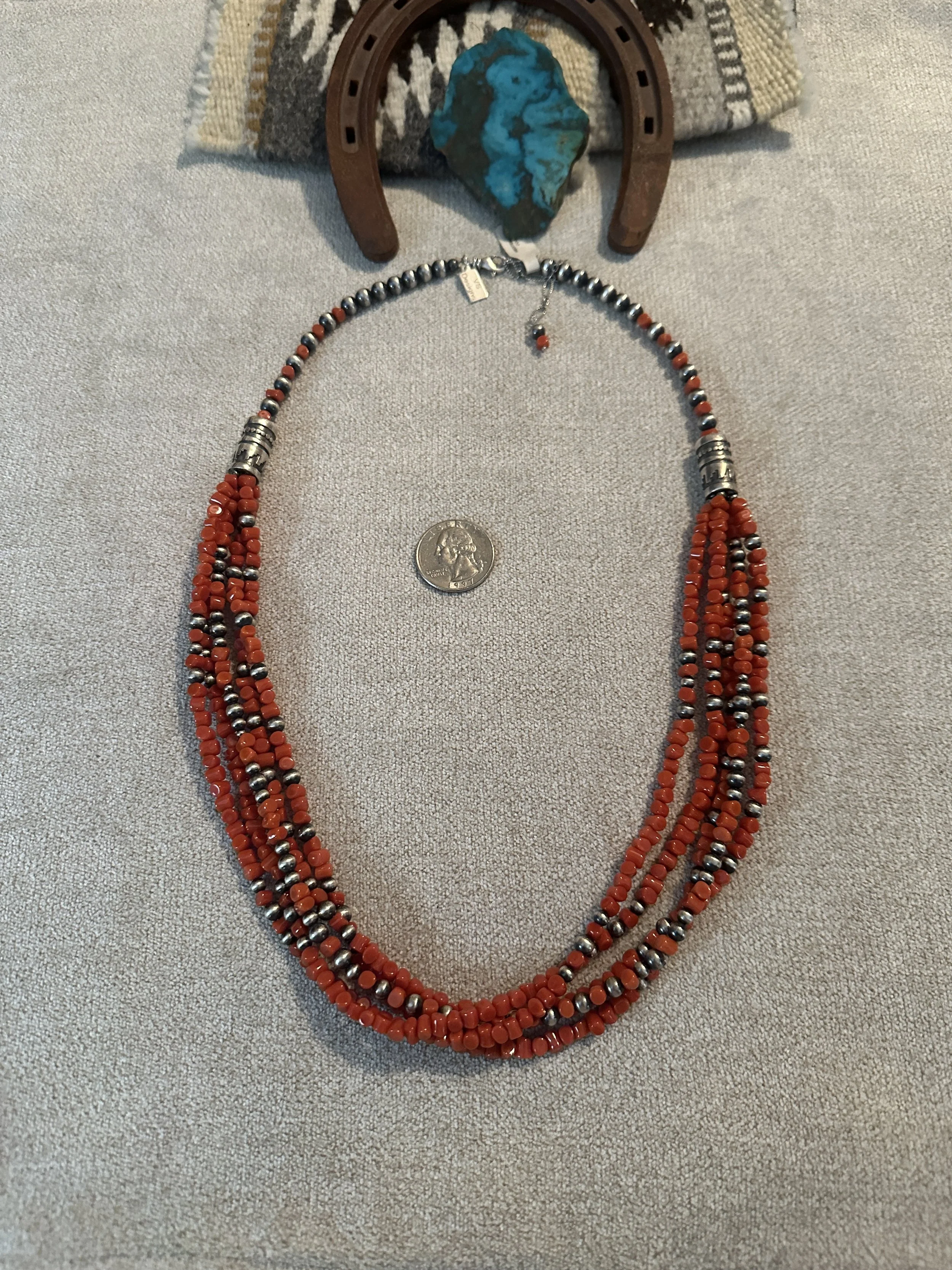 Five Strands Of Mediterranean Coral paired With Desert Sterling Silver Pearls
