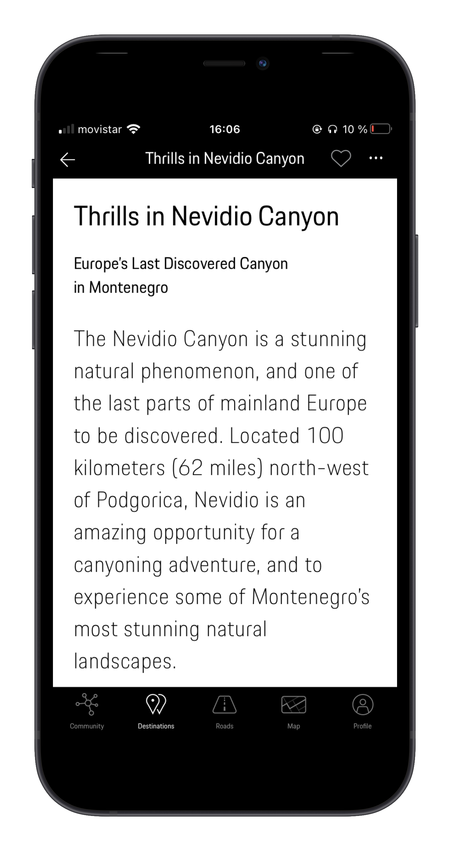 Smartphone displaying a travel guide article about thrills in Nevidio Canyon in Montenegro with text discussing the canyon's natural beauty and location.