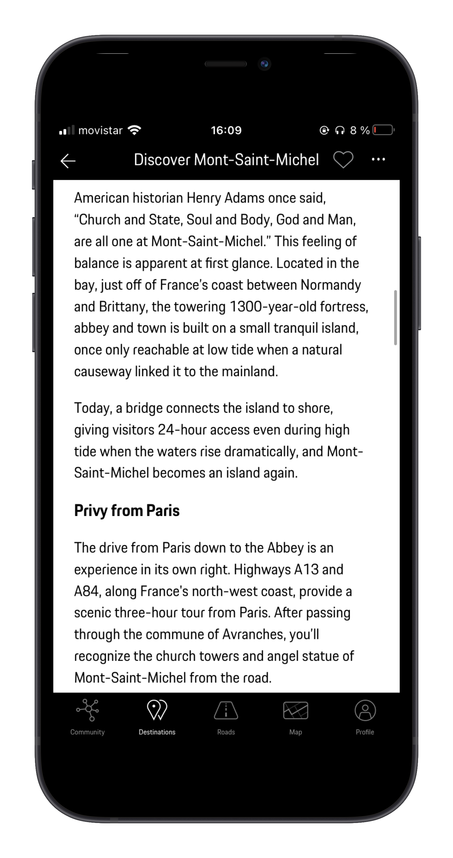 Mobile phone screen displaying a travel app with information about Mont-Saint-Michel, France, including historical background, location details, and travel tips.