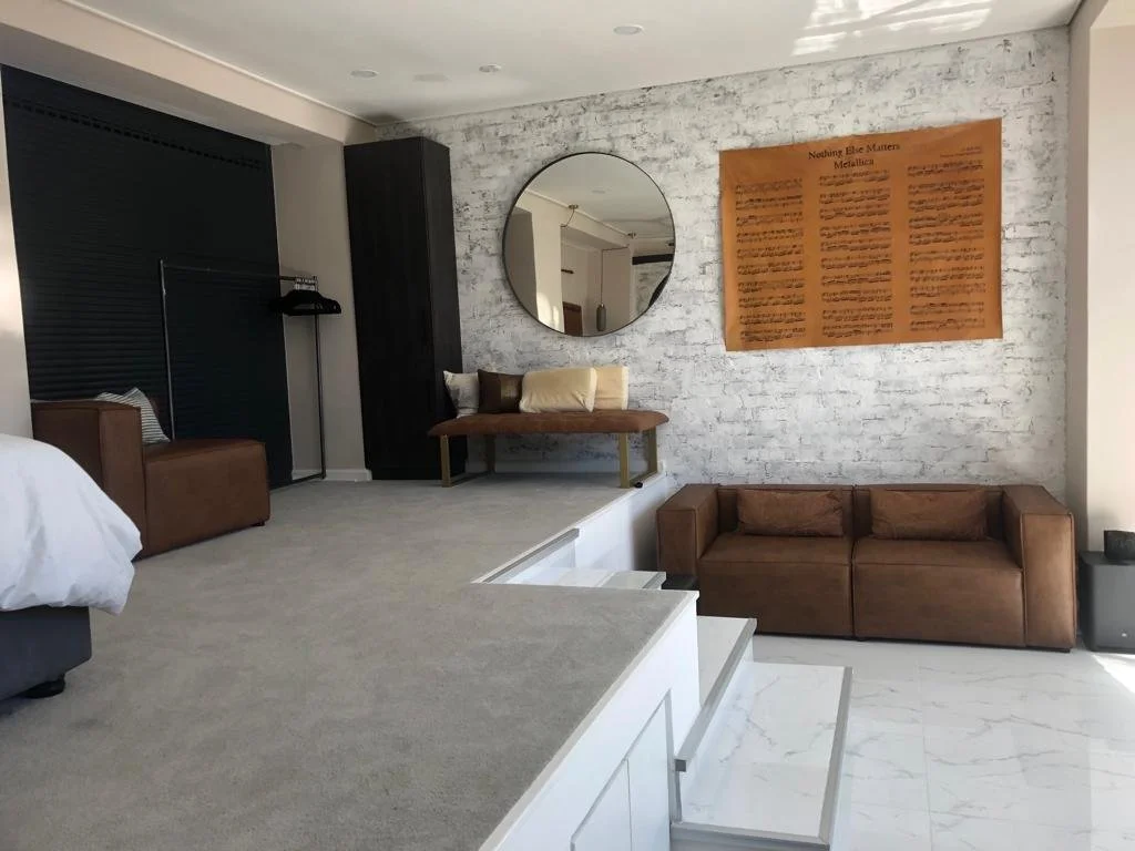 Main bedroom couch 2.jpg