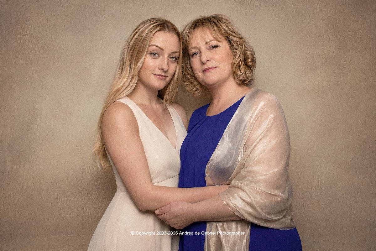 Mother and adult daughter portrait photographed in the studio, welcoming families from Plymouth, Devon and Cornwall.