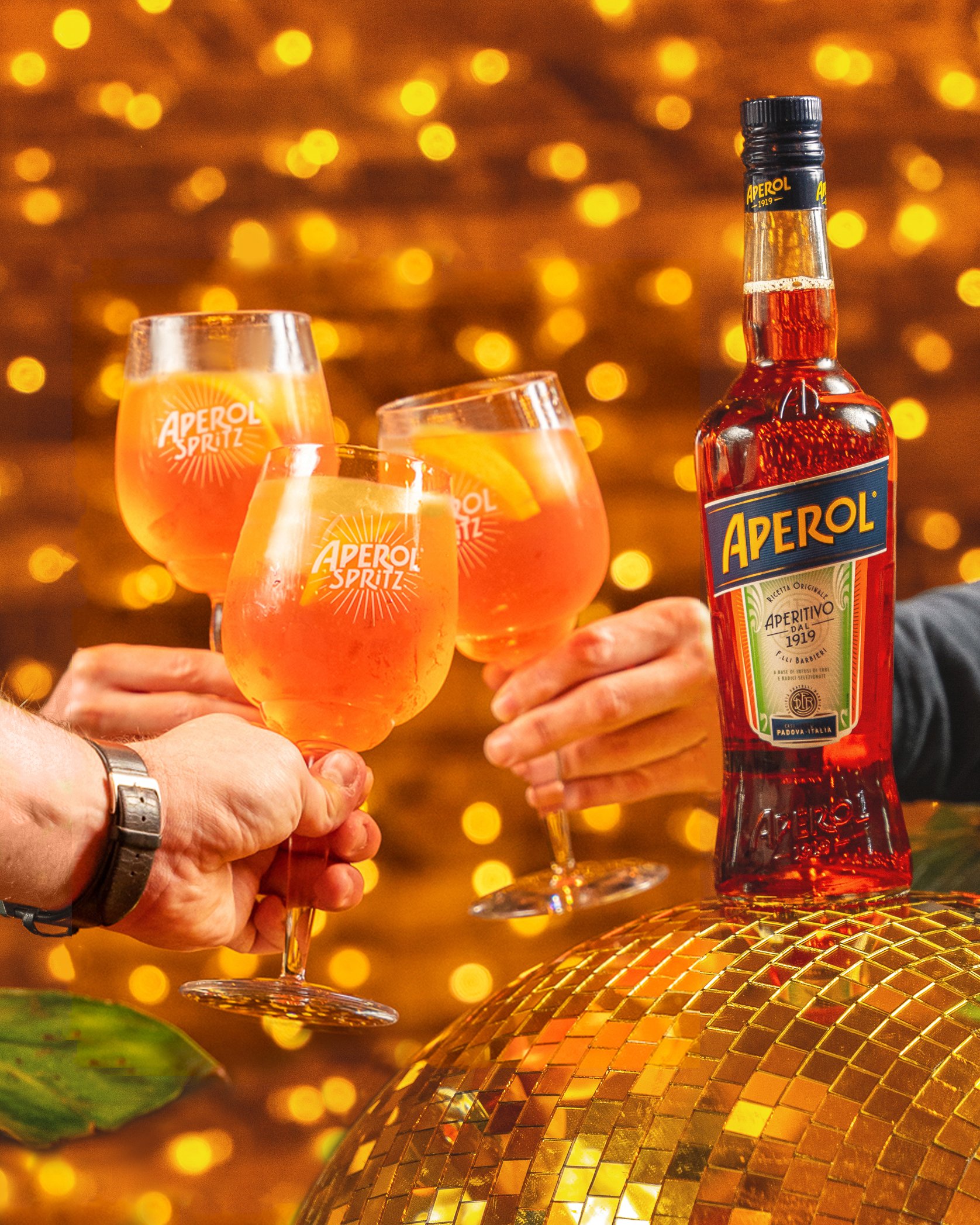 Aperol Group Shot - 5-7 Cropped - Without Christmas Hat.jpg