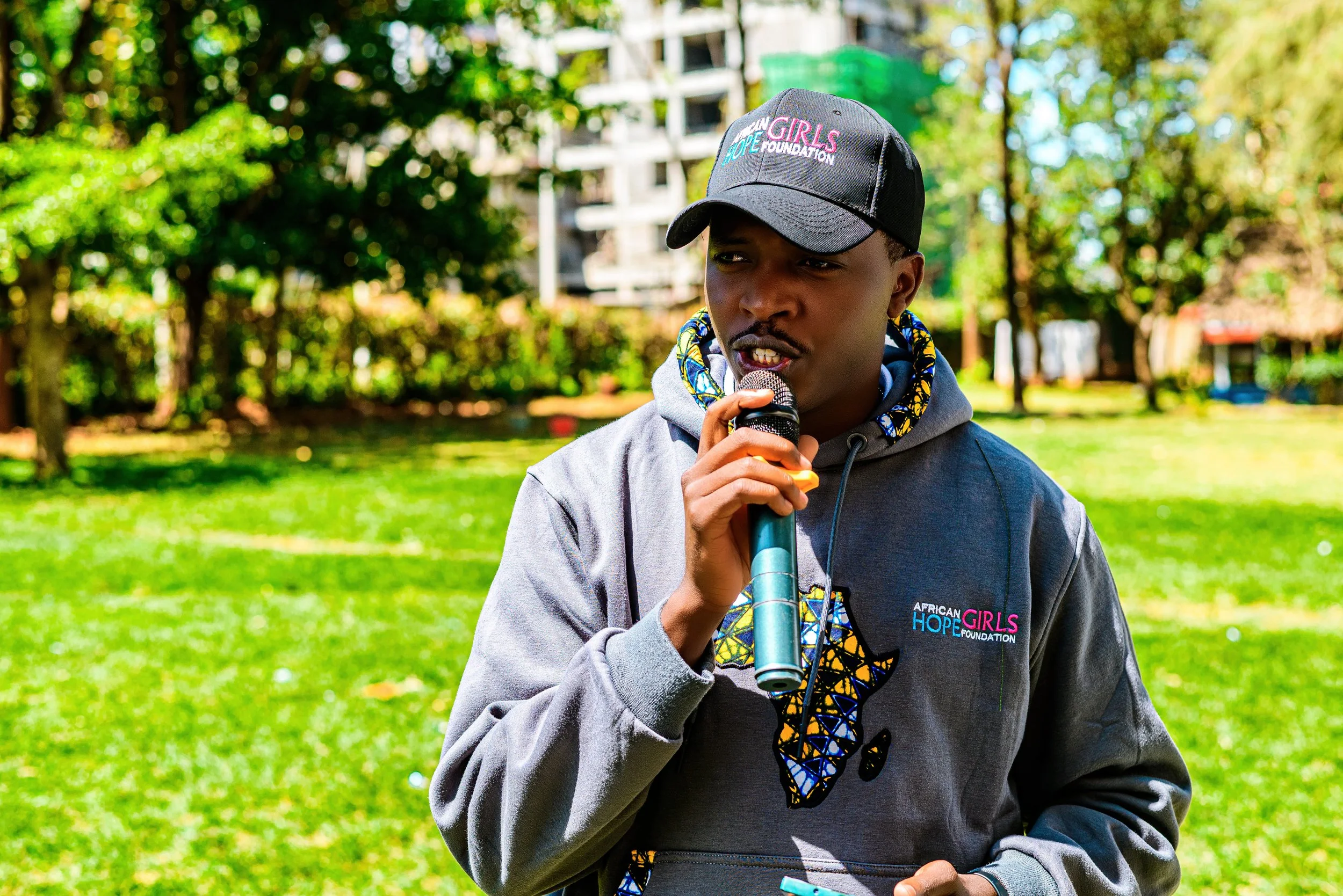 Program director speaking to African girls in Kenya.