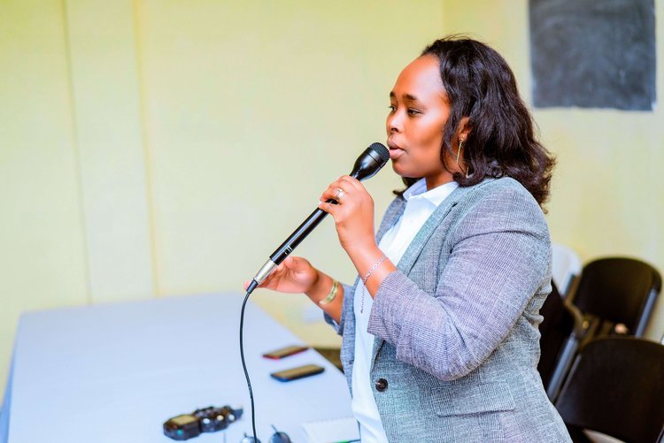 Dr. Grace speaking to African school girls about the importance of education.