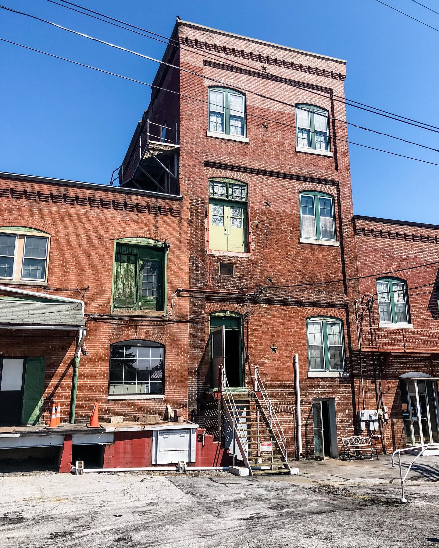 While we&rsquo;ve been working hard on the renovations inside, we&rsquo;re also sprucing up the outside. Still a lot of changes to come..but most of the scrap metal is down from the front of the building. (Swipe to see the before ➡️)