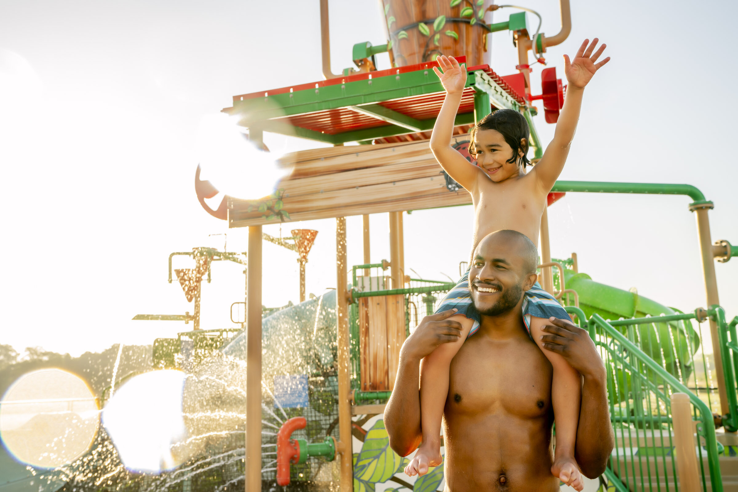 Dad-carying-son-on-shoulders-at-resort-water-park-Inti-St-Clair-is20180508_Meridina_10155.jpg