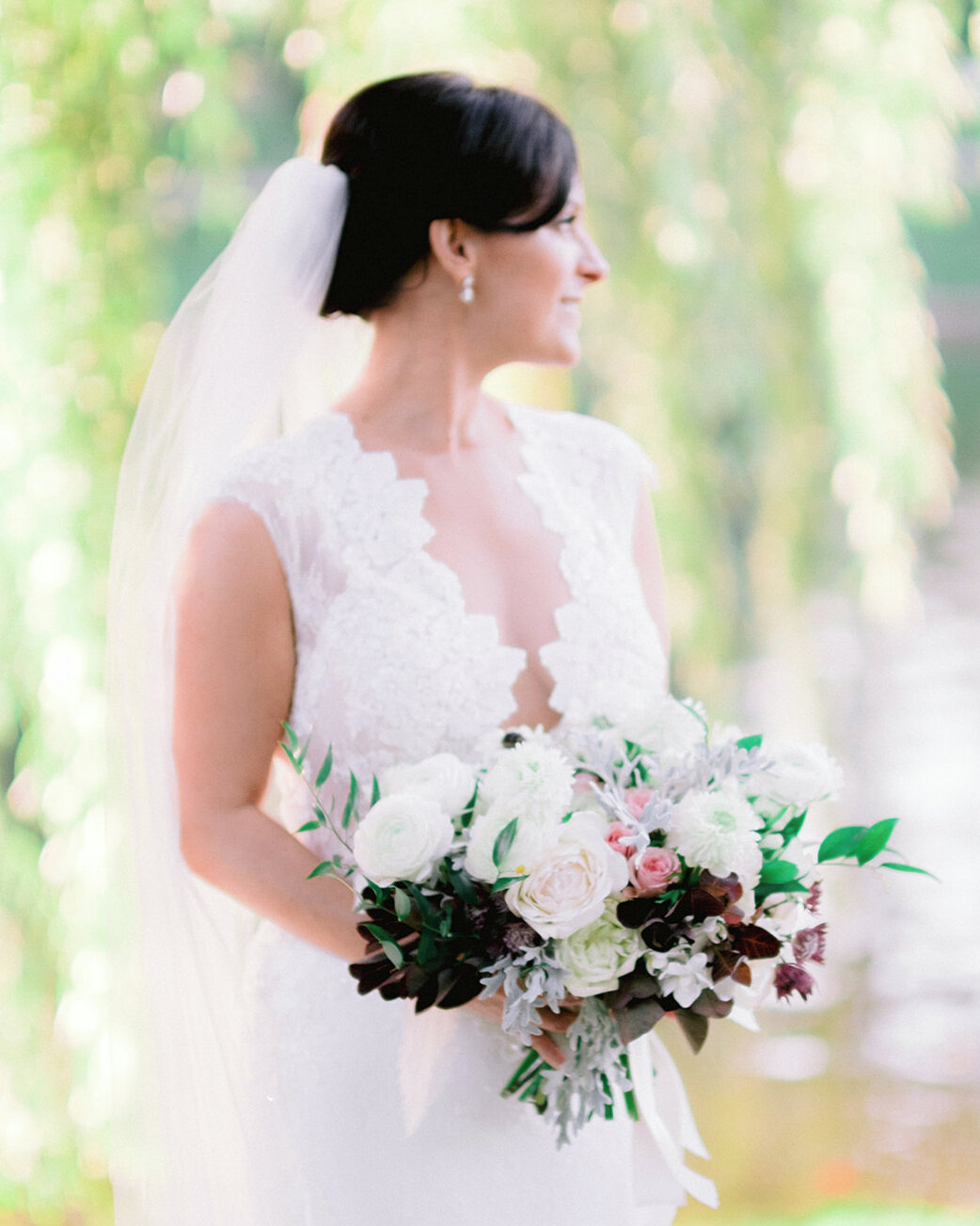 A classic bridal bouquet with pops of colorful florals? Sign us up 😍 (Photography: @melissastimpson, Planning, Design, and Florals [Excluding Chuppah]: @ajwevents, Venue: @fsboston, Floral Chuppah: @forevermarkflowers, Event Furniture: @luxeeventren