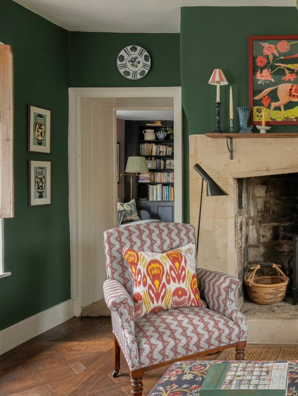 Colour and pattern and plates and art and cosy corners make a home 🧡