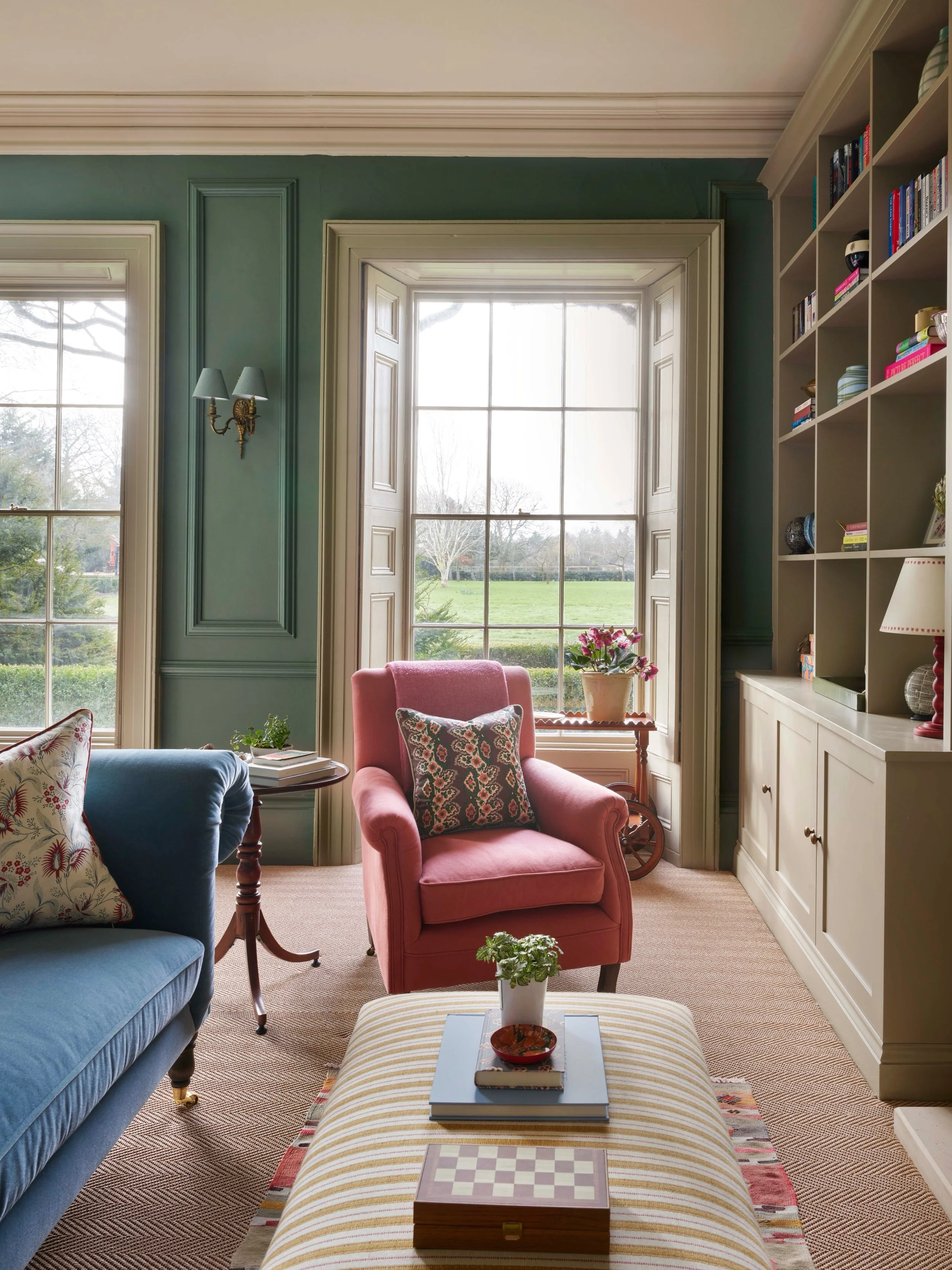 This formal reception room in our Peterborough project could easily have ended up being a space that was only used on special occasions, so we thought carefully about how to make it work for everyday family life too.

It doubles as a games room, with