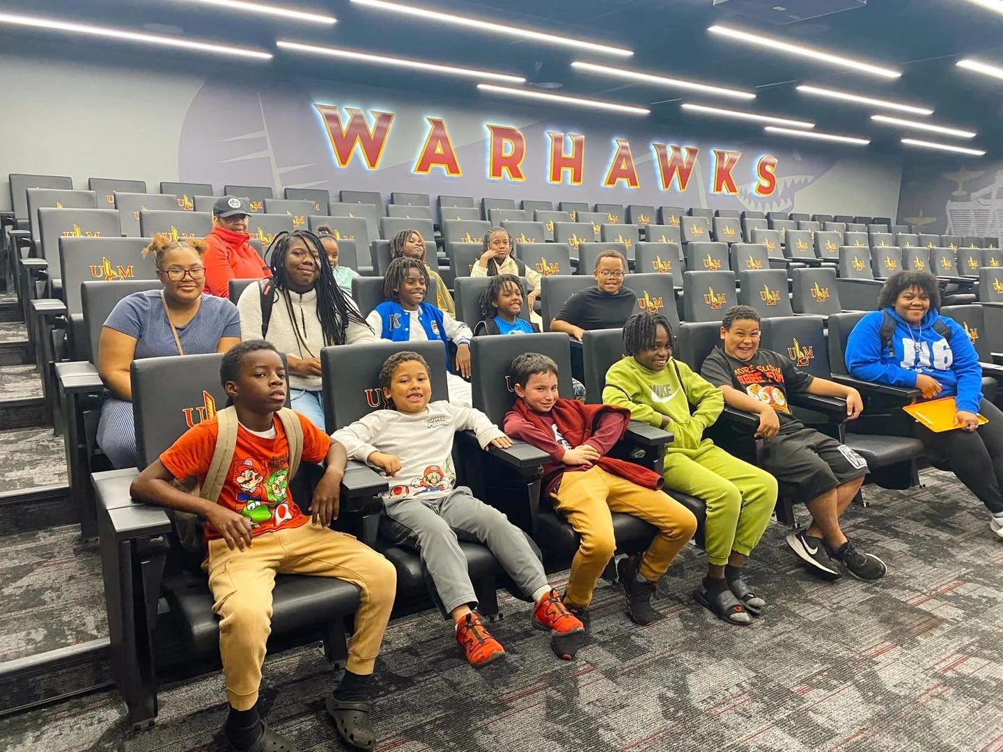 ULM Football rolled out the maroon carpet for club kids during their holiday break. 🏟️

Club kids were able to tour the awesome football facility, meet and greet with Head Coach Bryant Vincent, assistant coaches and the entire football team.  The gr