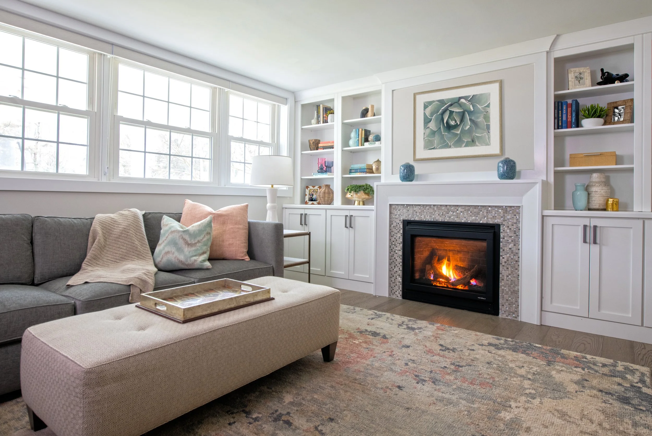 Family room, basement, built-ins, fireplace, accessories, sectional, sofa, ottoman, console, natural light, soft neutrals, bright and airy, white walls, villanova, pa, main line, philadelphia, chester county, interior design, renovation, interior des