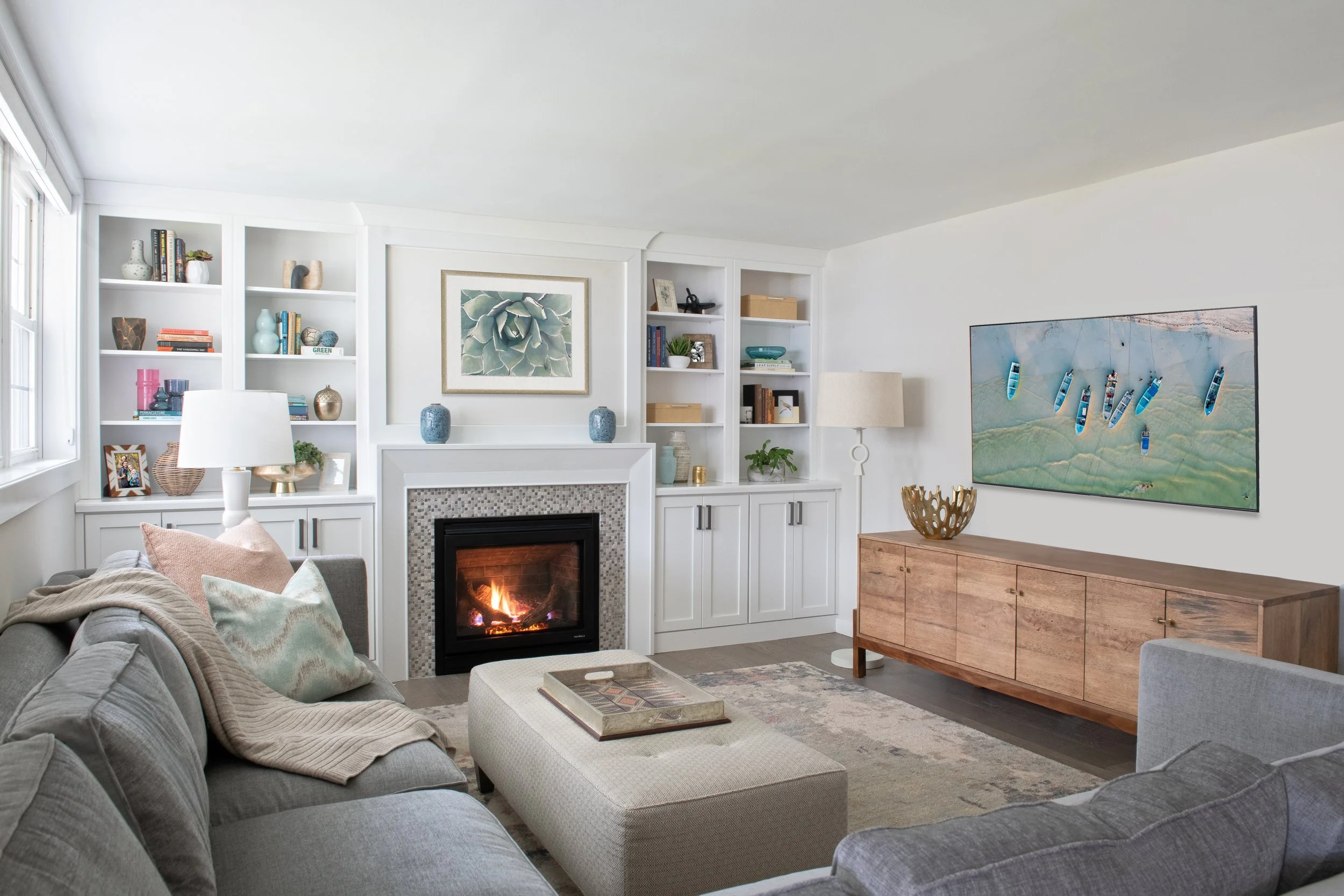 Family room, basement, built-ins, fireplace, accessories, sectional, sofa, ottoman, console, natural light, soft neutrals, bright and airy, white walls, villanova, pa, main line, philadelphia, chester county, interior design, renovation, interior des