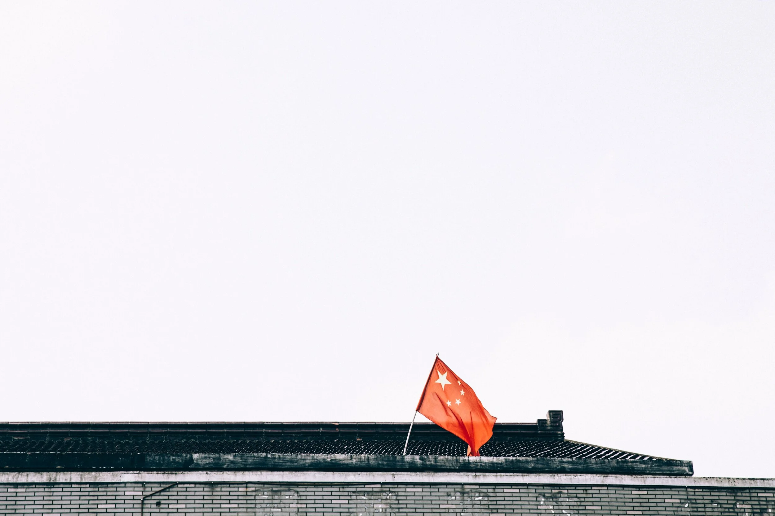 chinese-flag-on-temple-rooftop.jpg