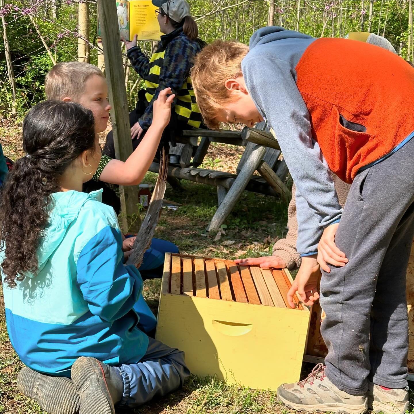 It was a wonderful day to wrap up our Earth Day celebrations this week with our Forest Friday students while learning about bees! The day began with some exploration of beekeeping tools and supplies, including trying out a beekeepers suit and smoker!