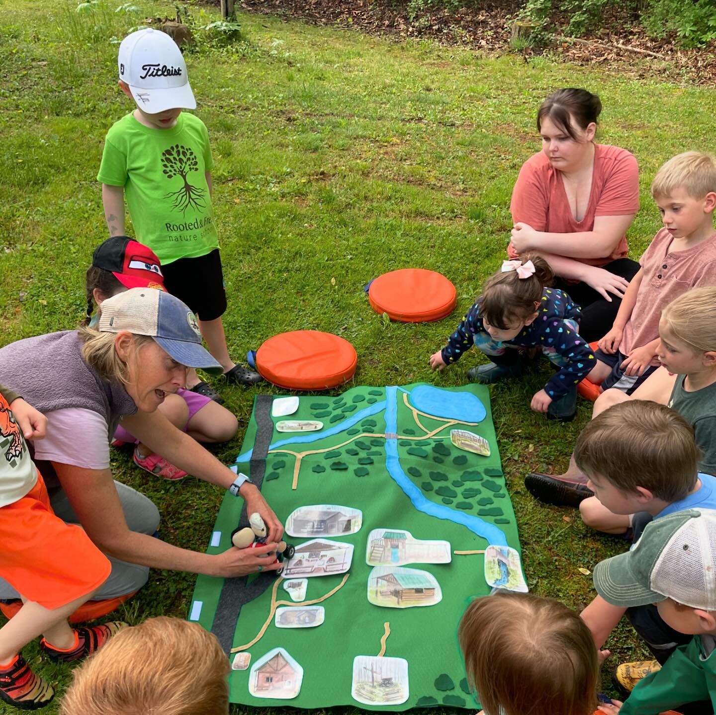 Today our nature preschoolers used a map to visualize our travels for the day! Our very own Ms. Alex created a detailed map of camp and many of the features and locations that we visit while at school, and it showed us a path to the nature play space