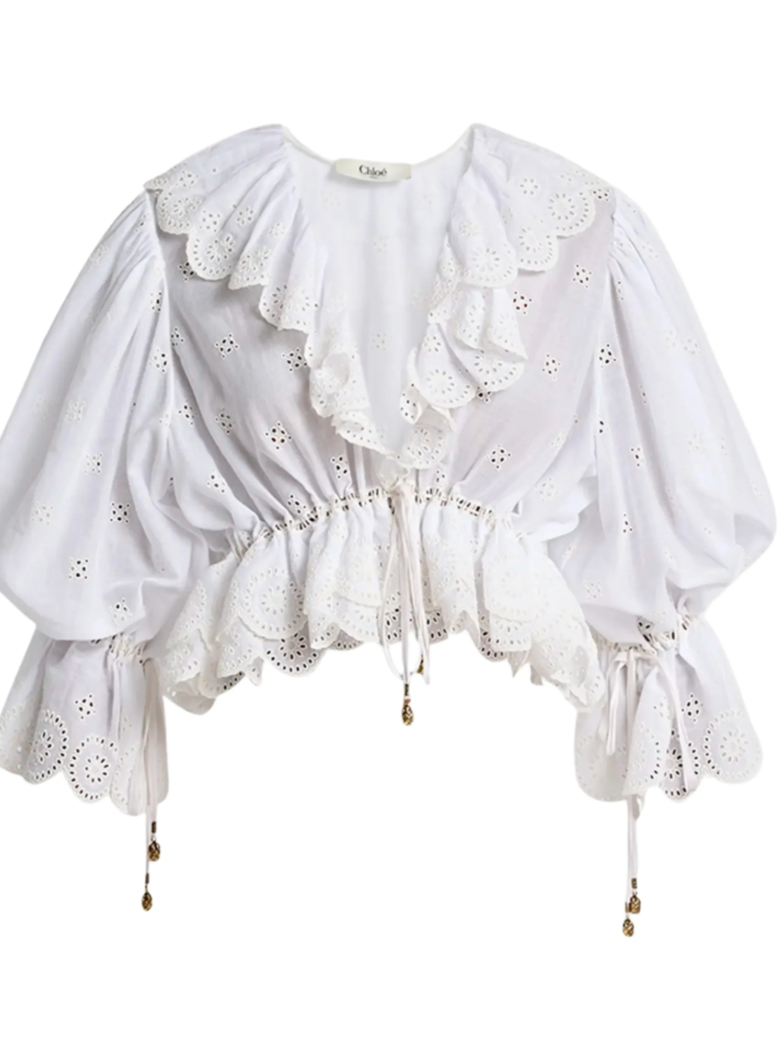 3/4 blouson sleeves
Self-tie ruffle cuffs