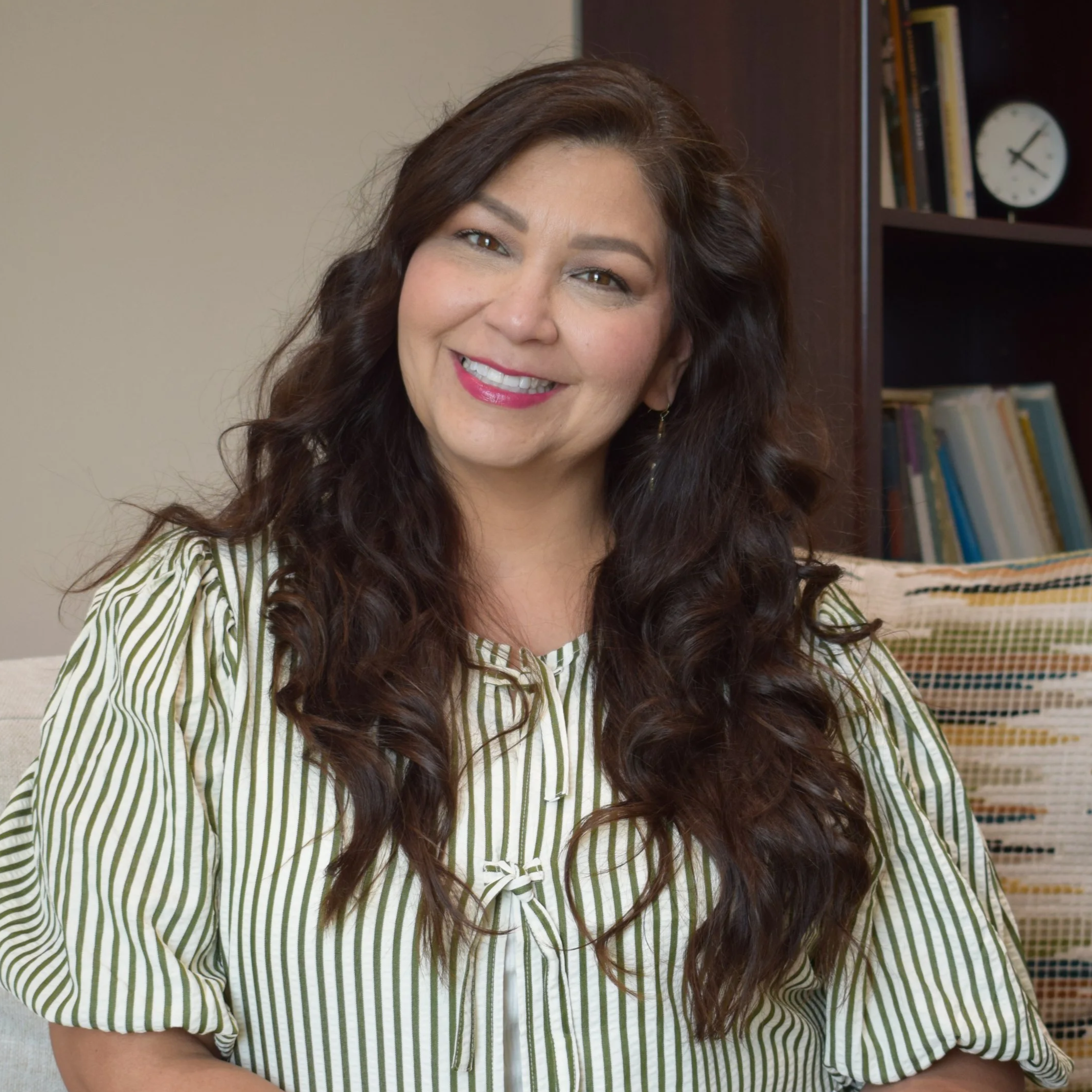 Female latina therapist in therapy office.