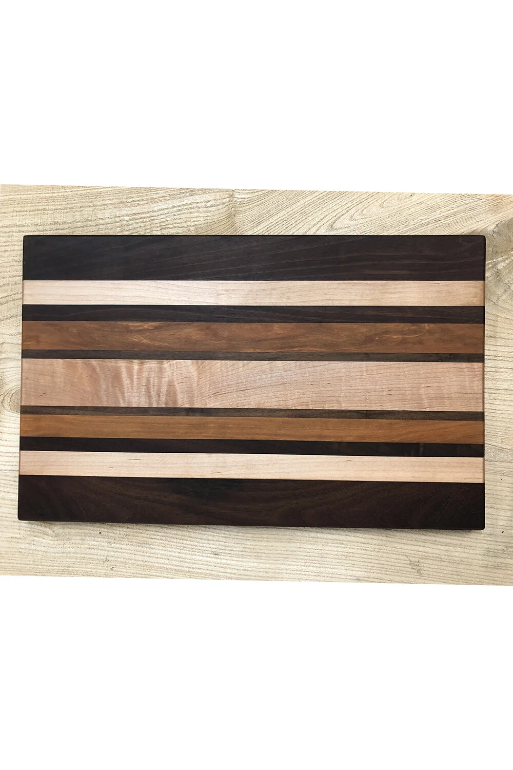 Sold - black walnut, maple, and cherry