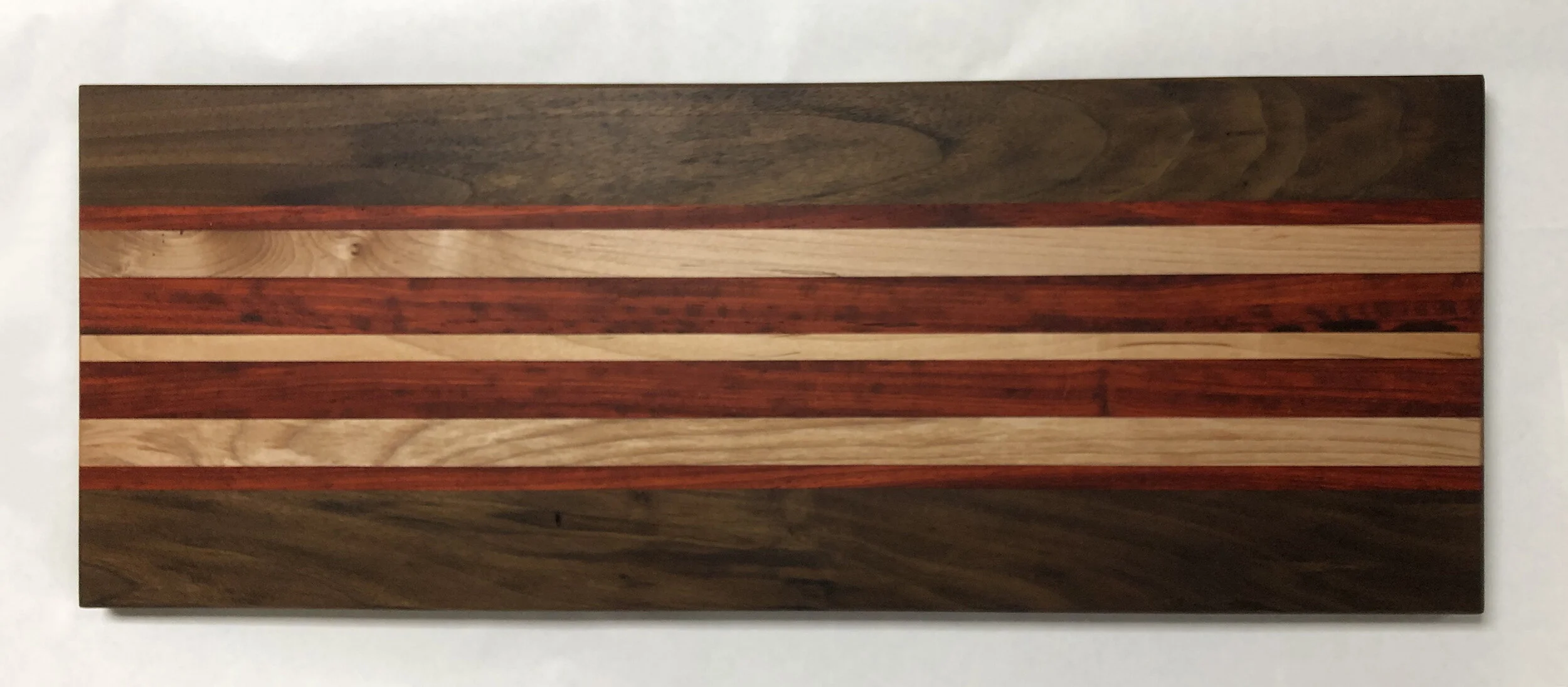 Sold ~ Charcuterie, black walnut, maple, padauk
