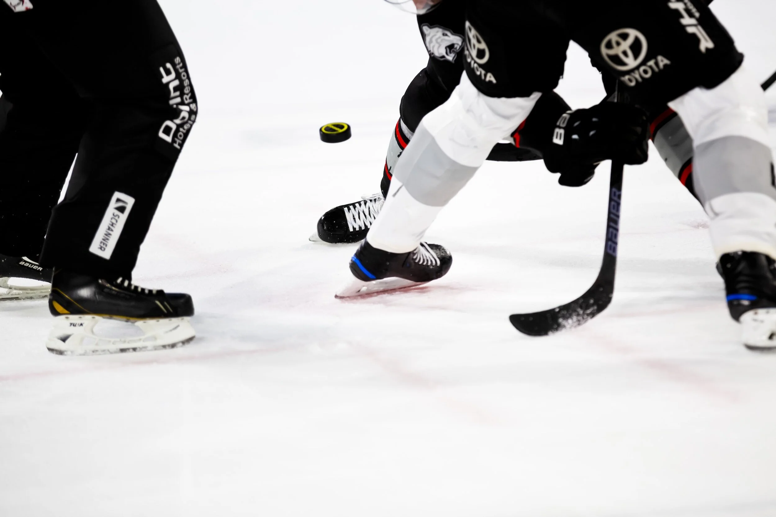 hockey, ice skates, hockey stick and puke.
