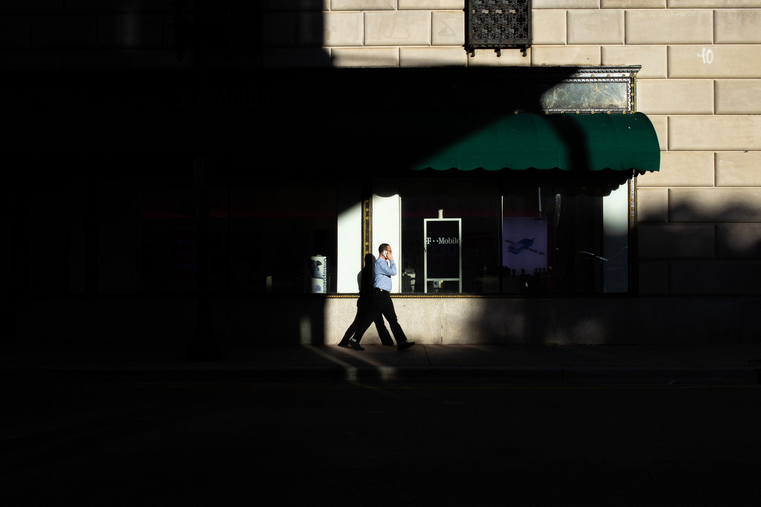 Man walking by Ingraham building-.jpg