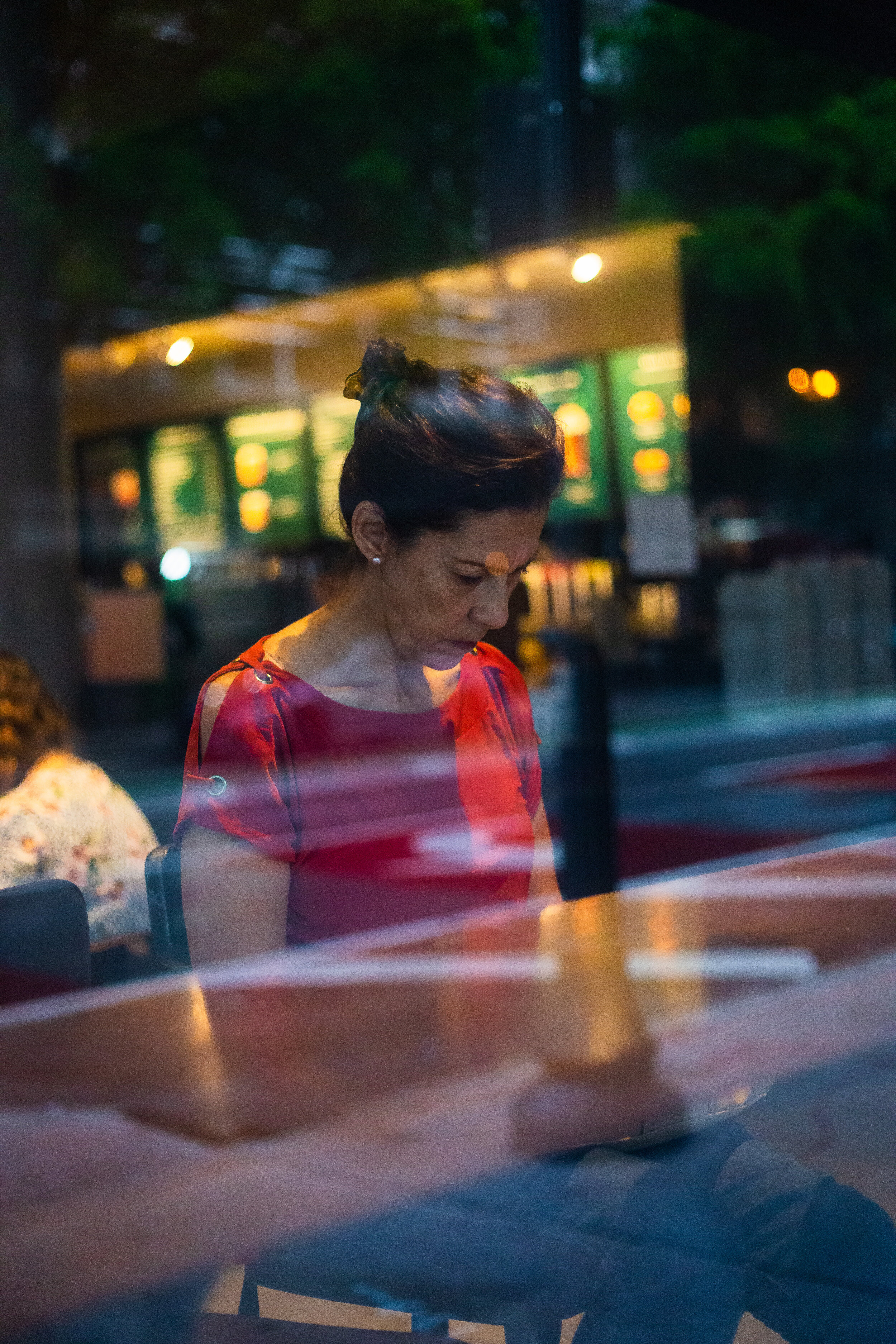 Woman red shirt-Starbucks window-.jpg