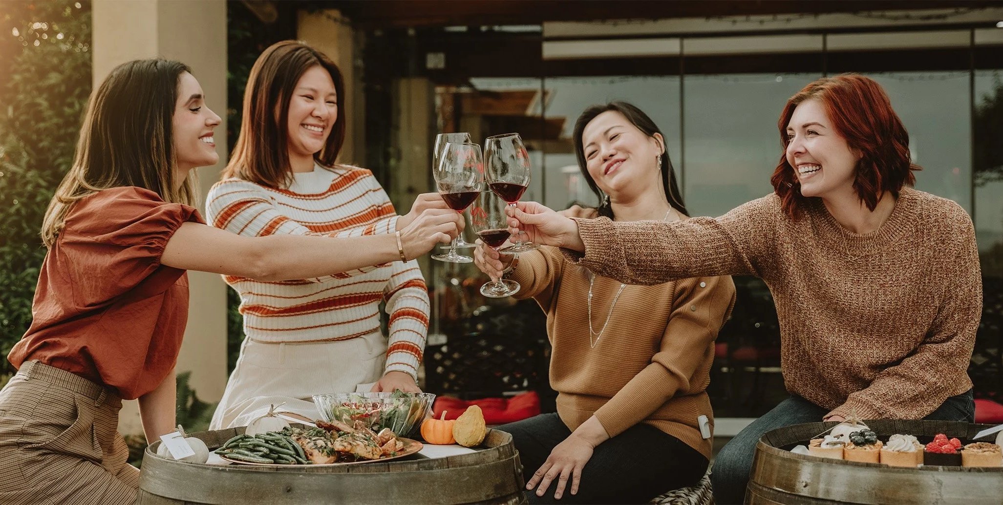 Michelle Roberts doing a cheers with wedding planners