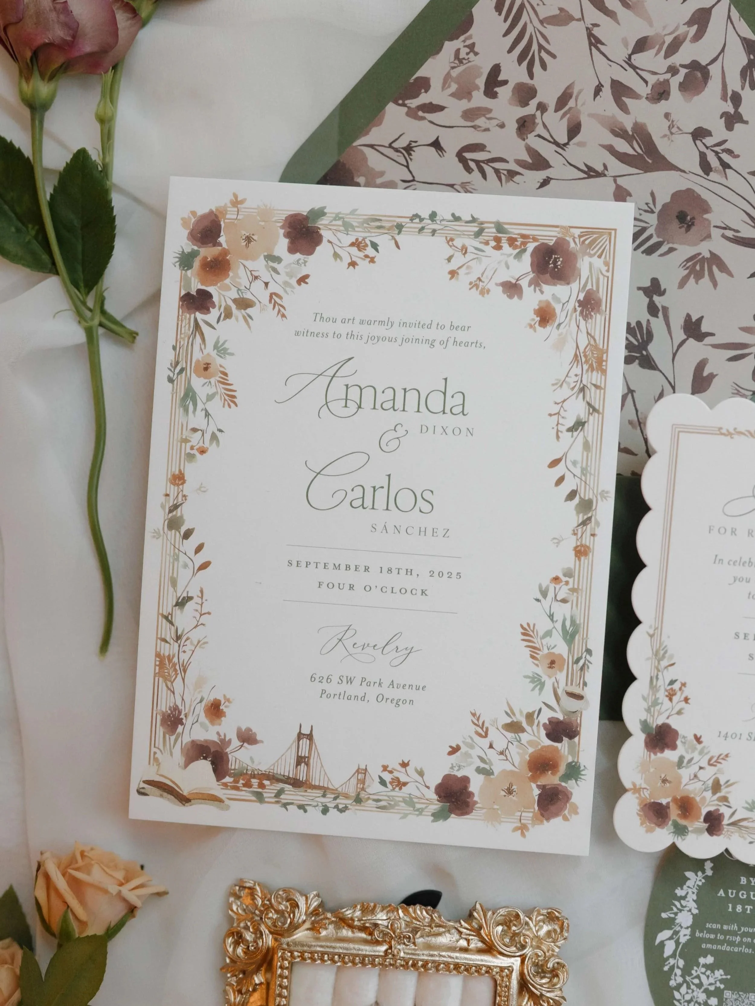 sage green romantic invitation suite with watercolor illustrations of florals and portland icons