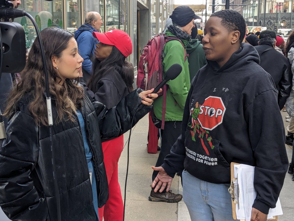   STOP’s restorative-justice coordinator and youth organizer Anna Durr speaks to news media  