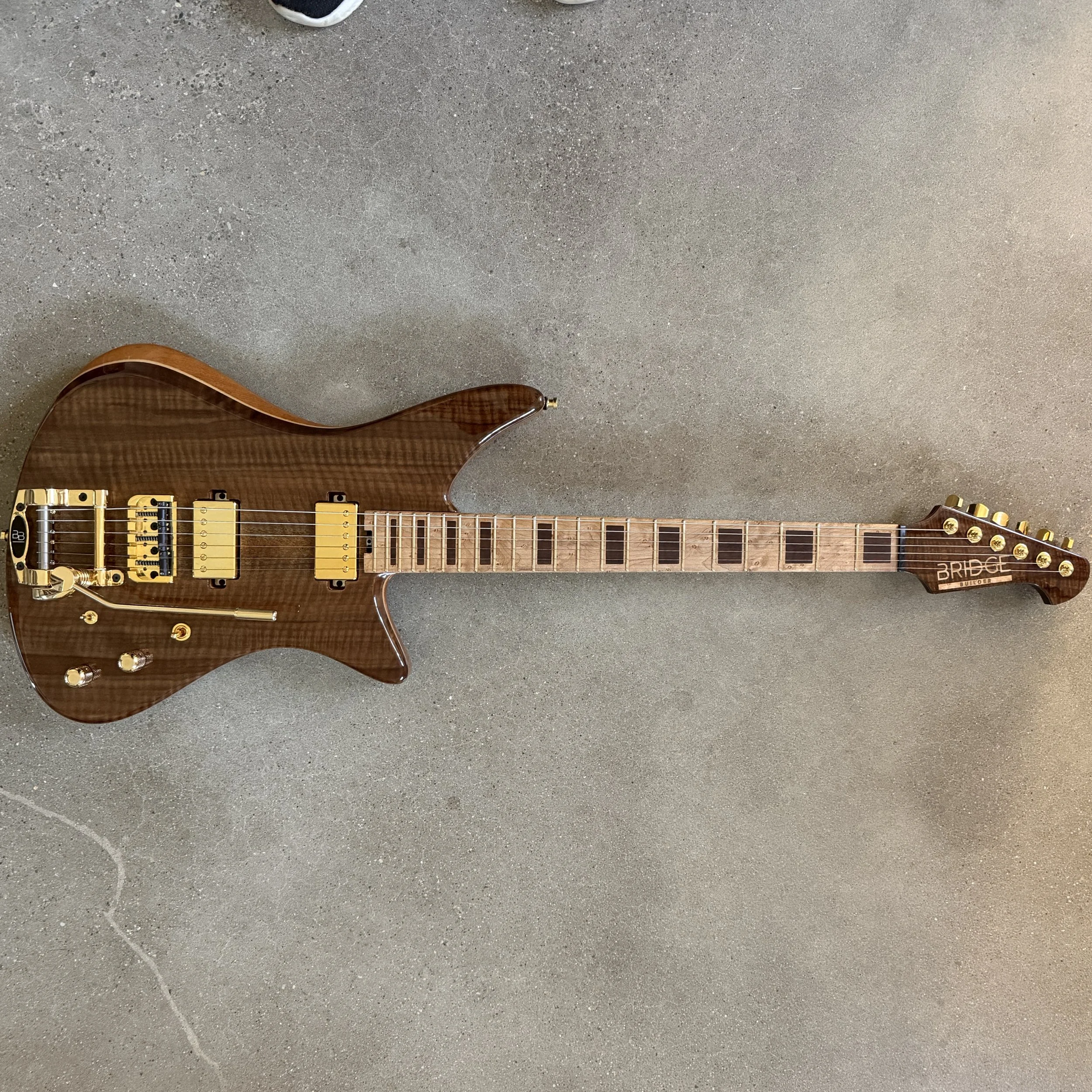 Flame Walnut Hornet w/vintage tremolo (available for purchase)