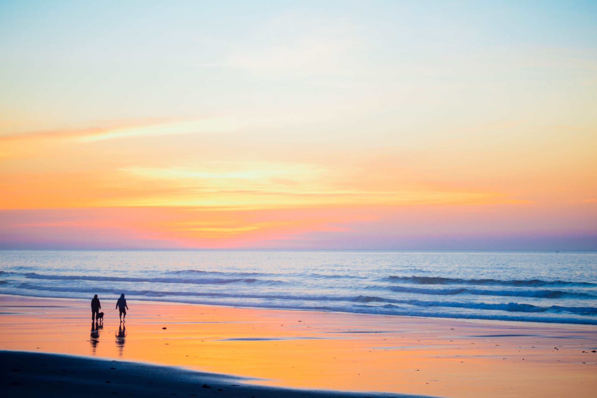 family walking on the beach.jpg