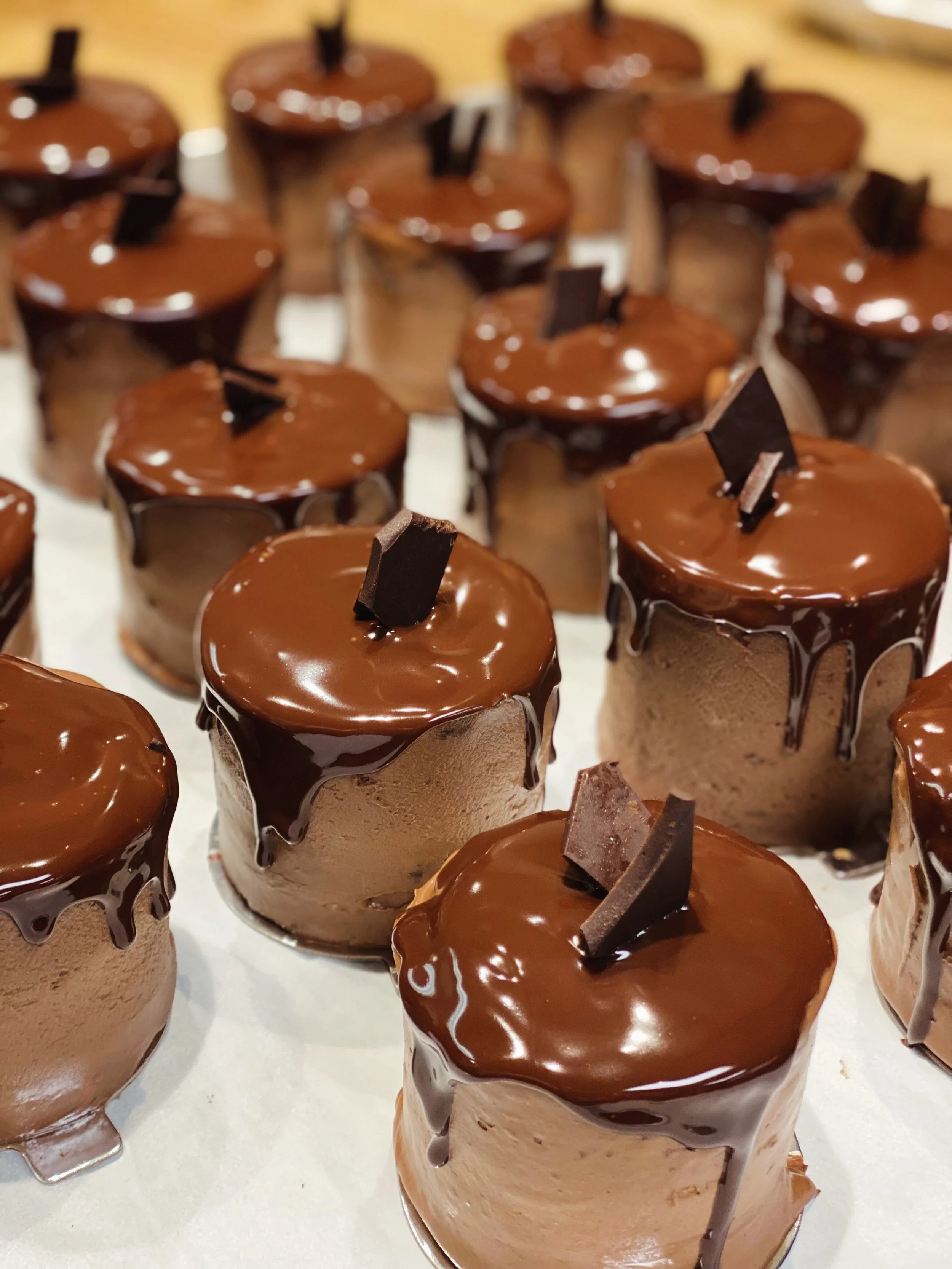 A little slice of decadence.

Our signature Chocolate Raspberry Baby Cakes feature layers of devil&rsquo;s food cake, chocolate mousse, fresh raspberries, chocolate buttercream, and a rich chocolate ganache finish.

Perfect for sharing, gifting, or e