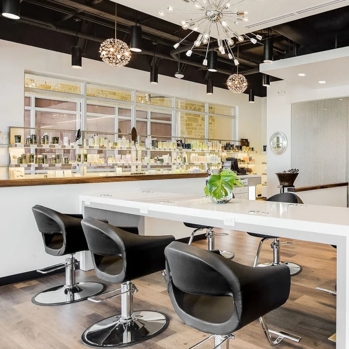 Styling chairs and the Aveda retail wall at Maximum FX Salon