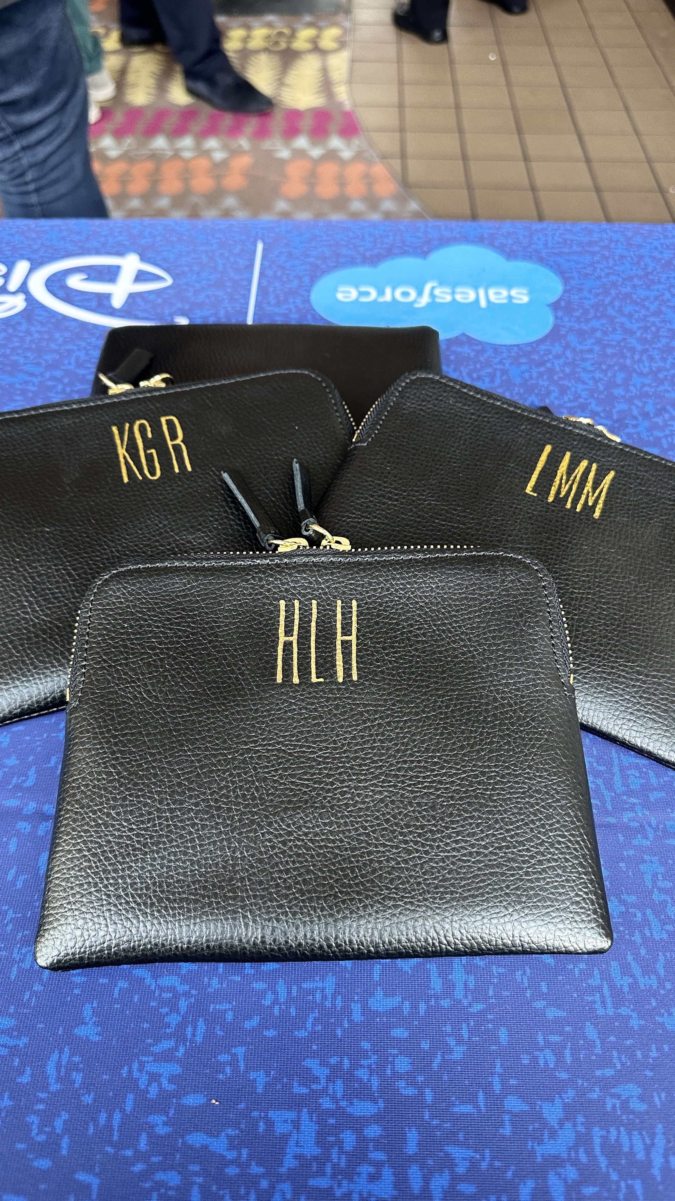 hot foiling embossing on leather pouches by Miami calligrapher a handful of letters