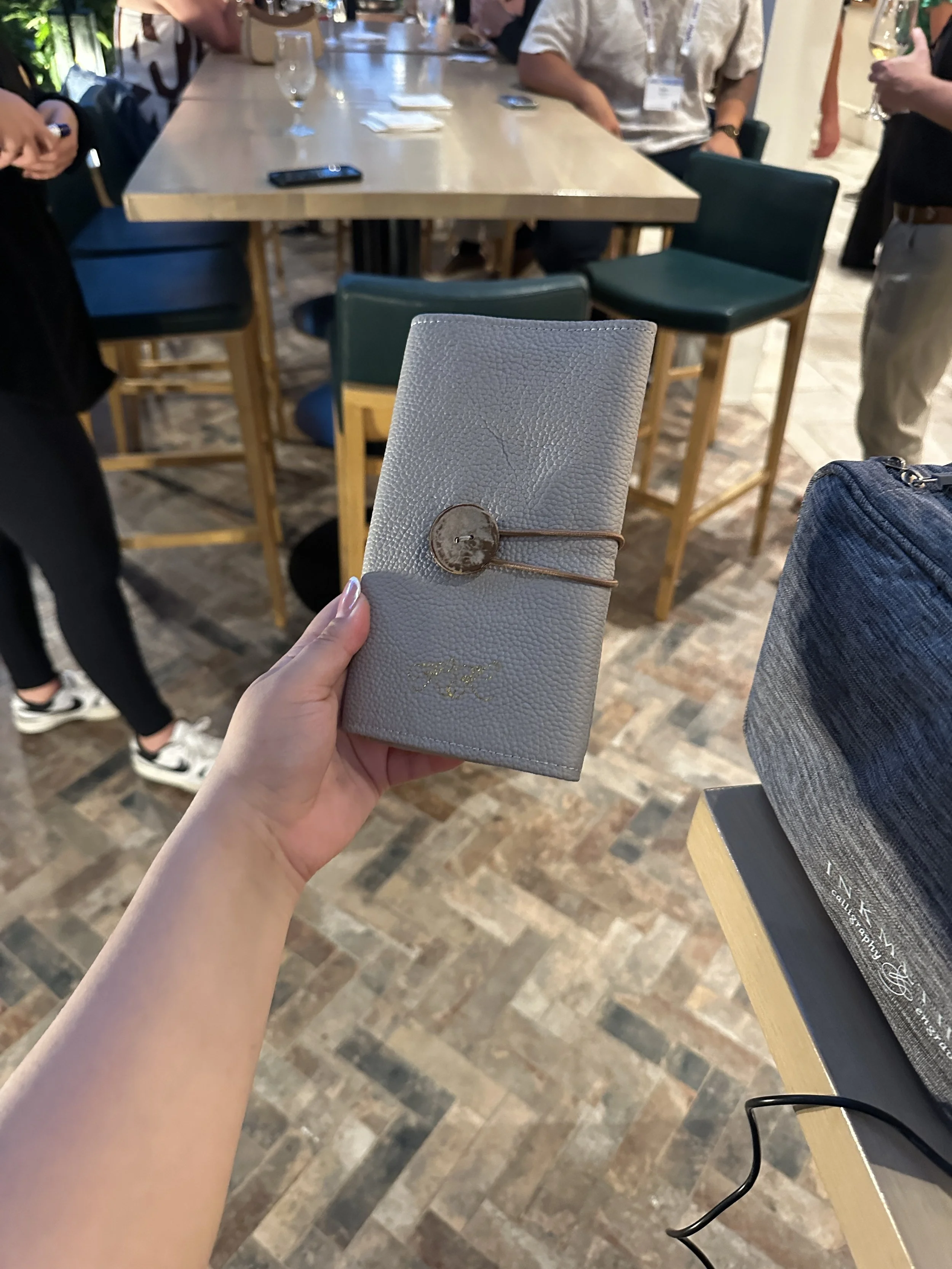 live hot foiling on leather goods for conference in orlando_8433.jpeg