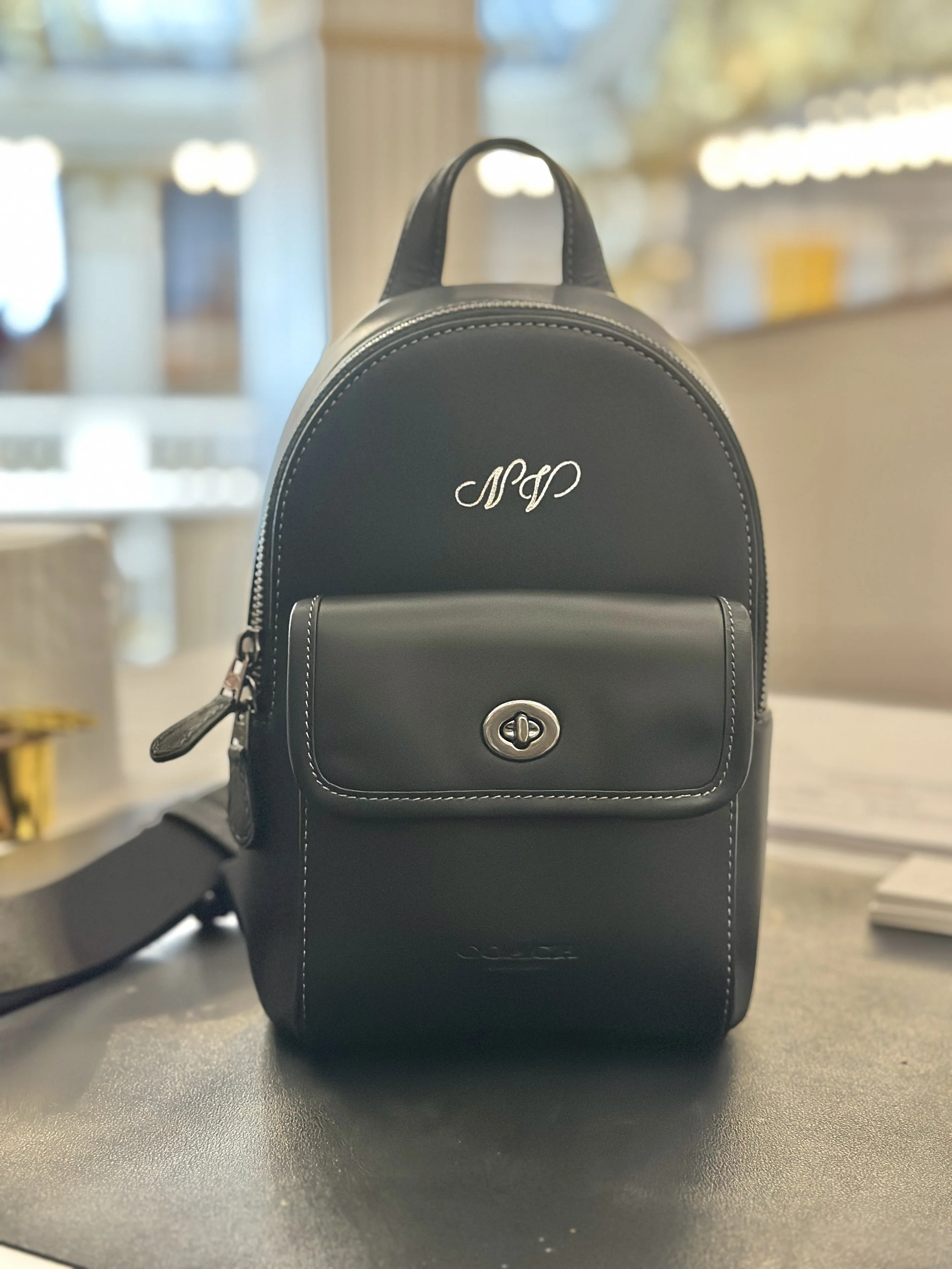 live hot foil embossing and monogramming on coach leather goods3865.jpeg