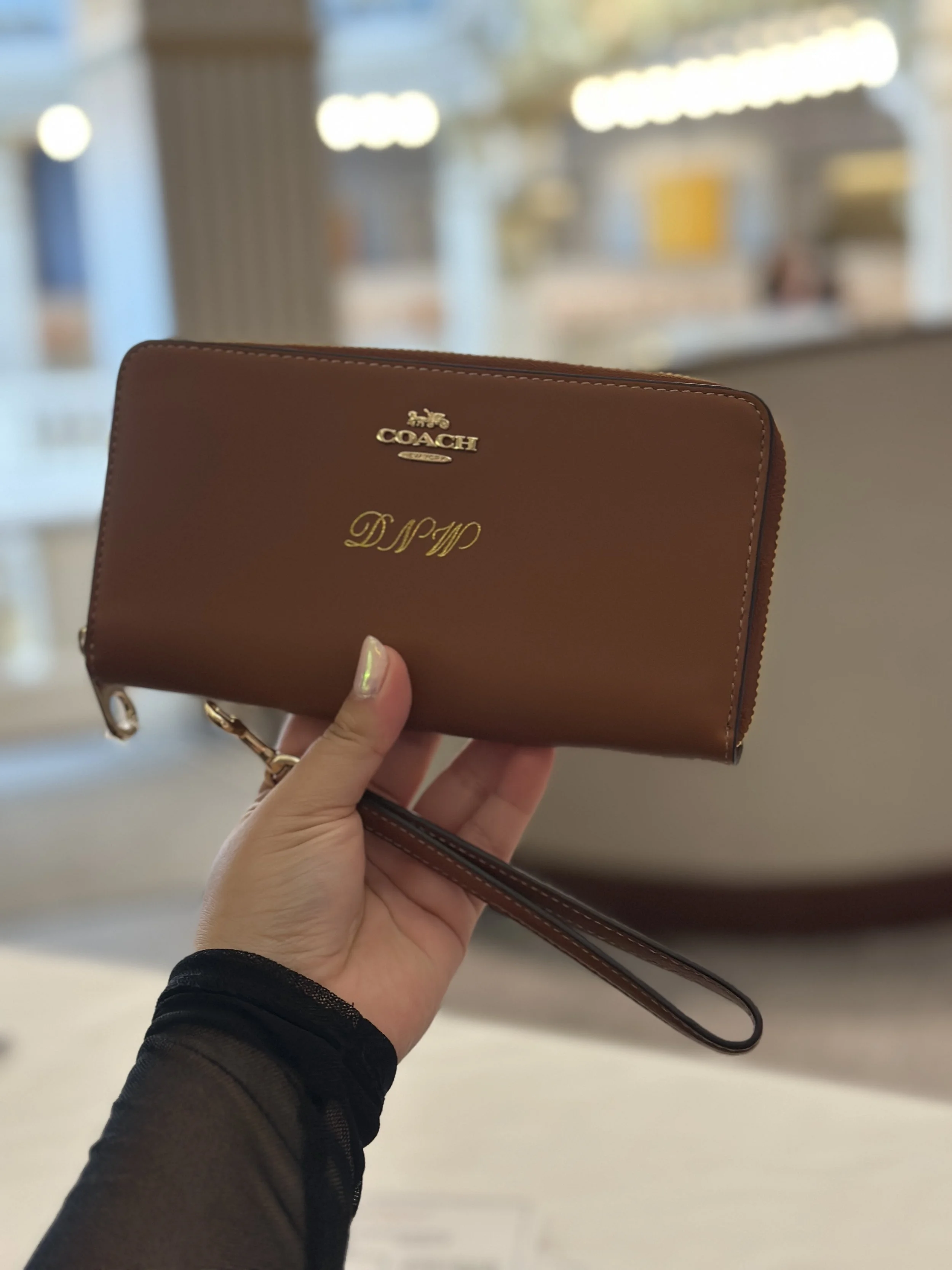 live hot foil embossing and monogramming on coach leather goods3859.jpeg