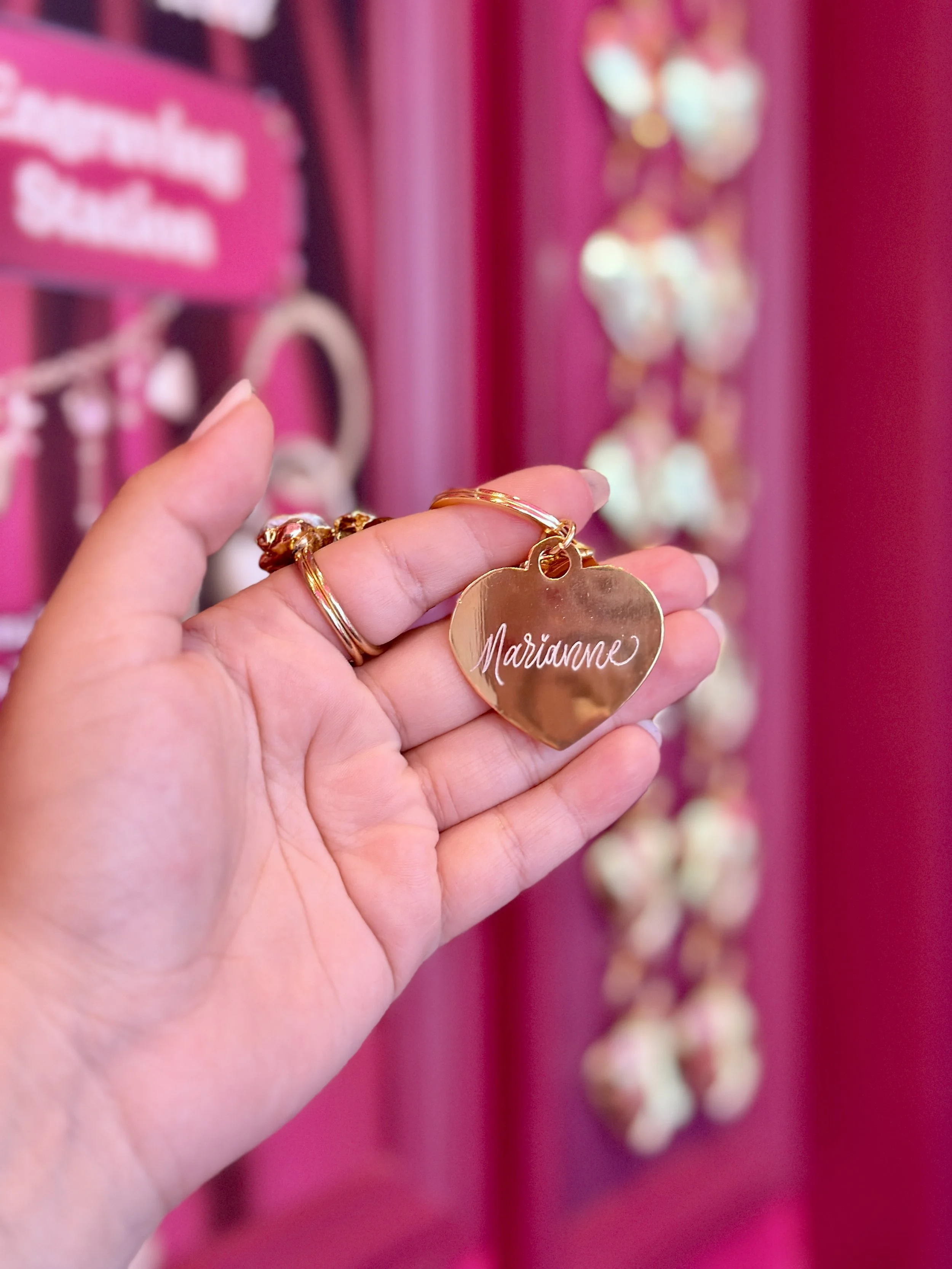 live calligraphy engraving on heart-shaped metal keychains5018.jpeg