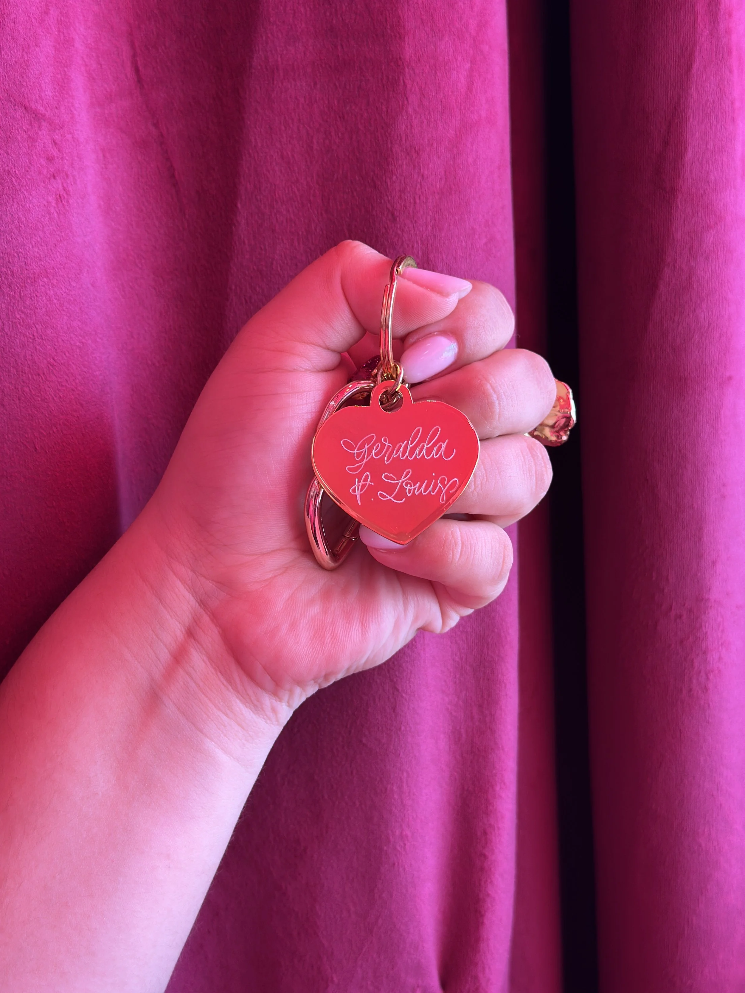 live calligraphy engraving on heart-shaped metal keychains5001.jpeg
