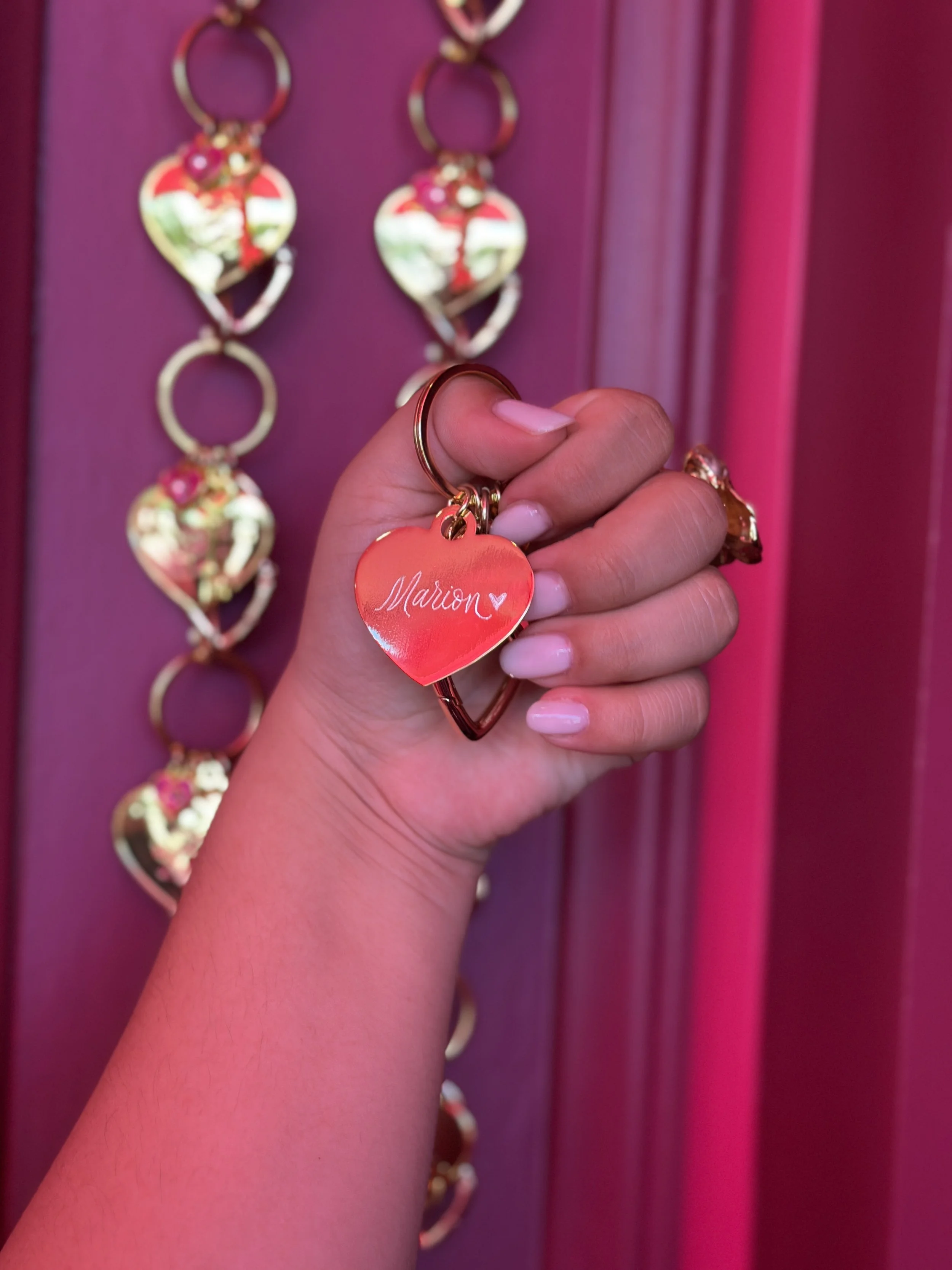 live calligraphy engraving on heart-shaped metal keychains4982.jpeg