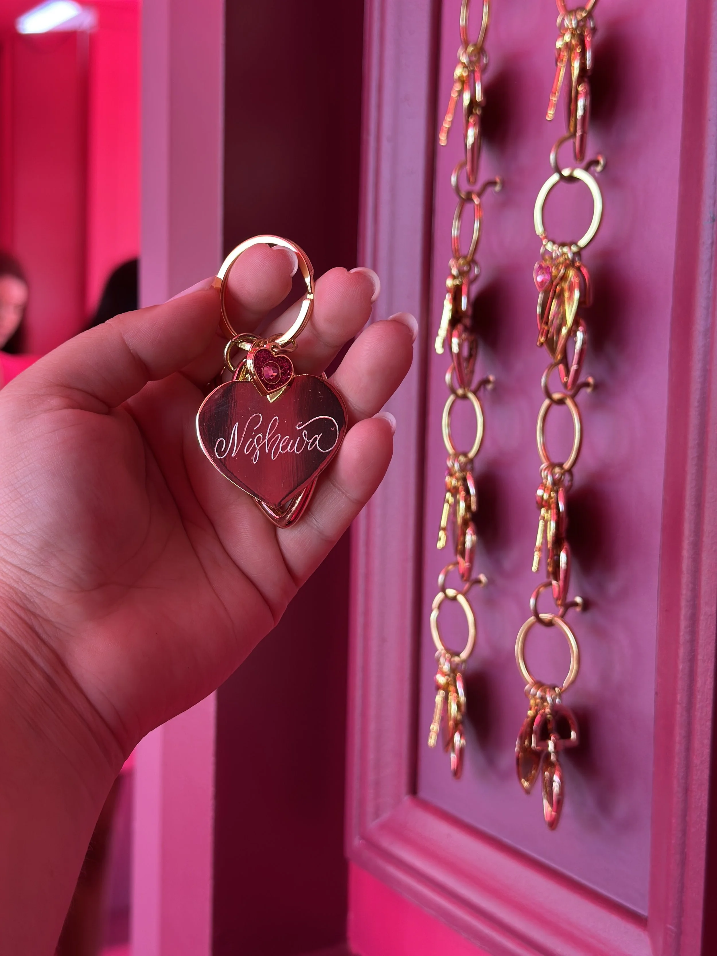 live calligraphy engraving on heart-shaped metal keychains4954.jpeg