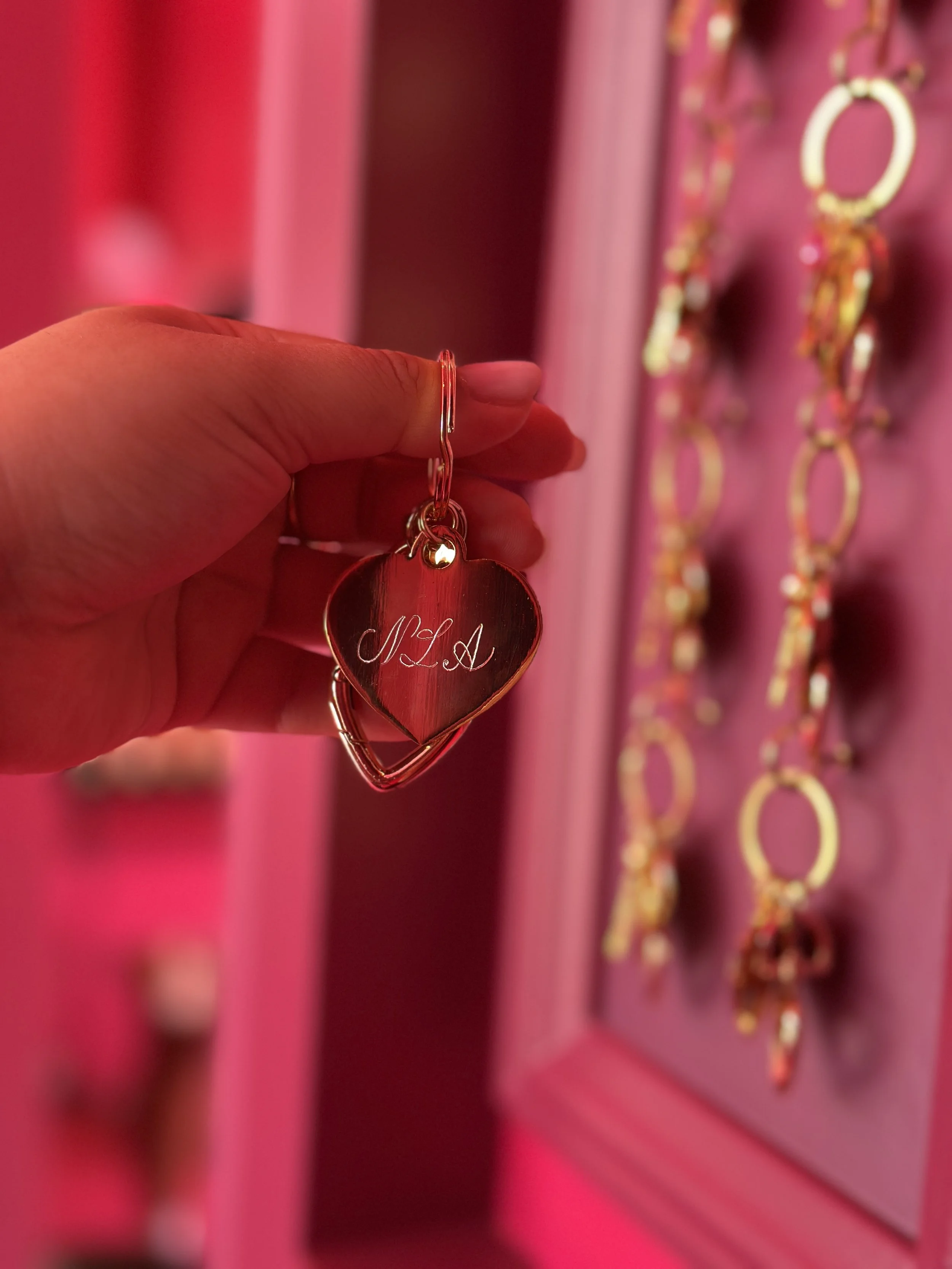 live calligraphy engraving on heart-shaped metal keychains4956.jpeg