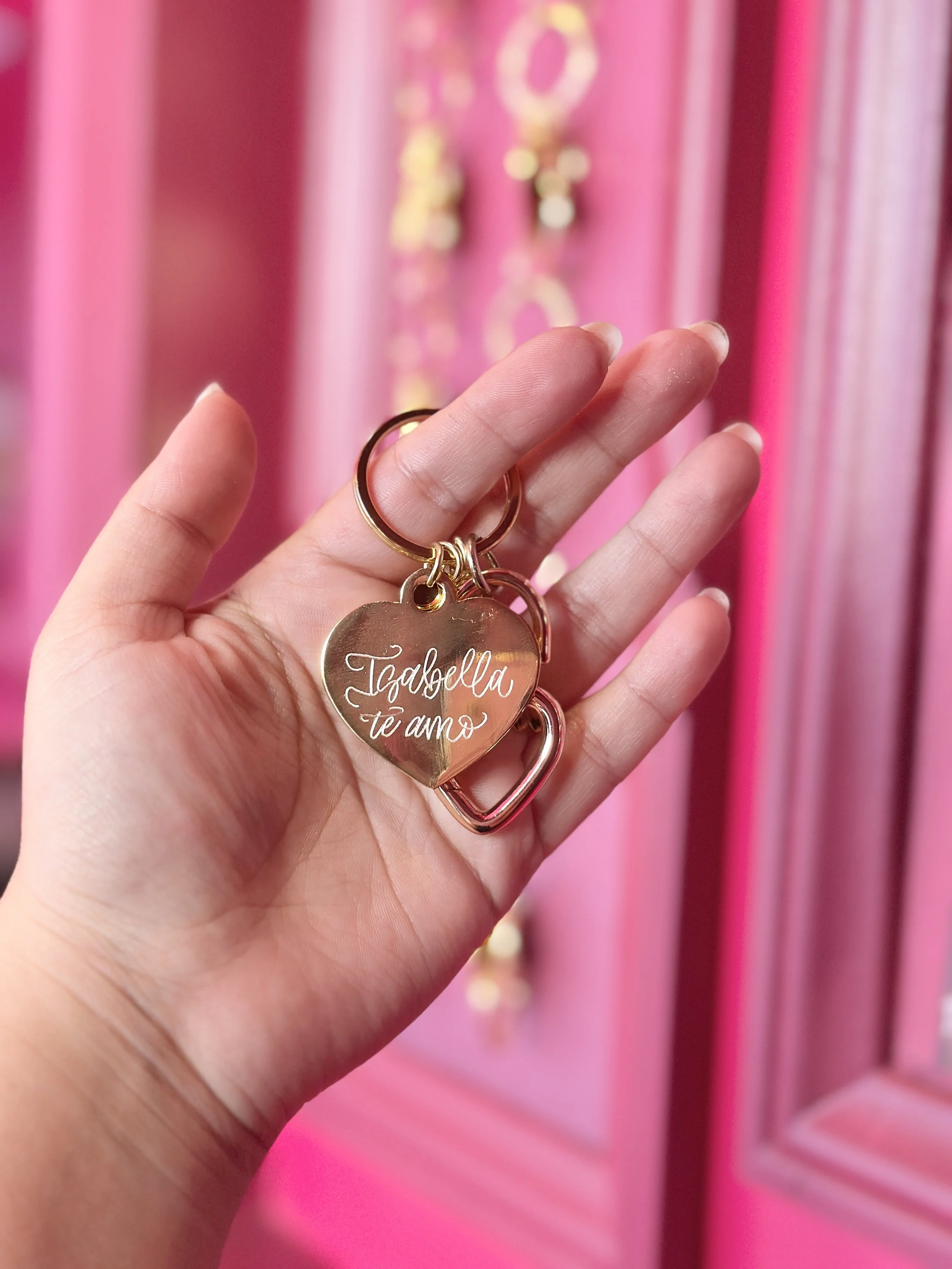 live calligraphy engraving on heart-shaped metal keychains4918.jpeg